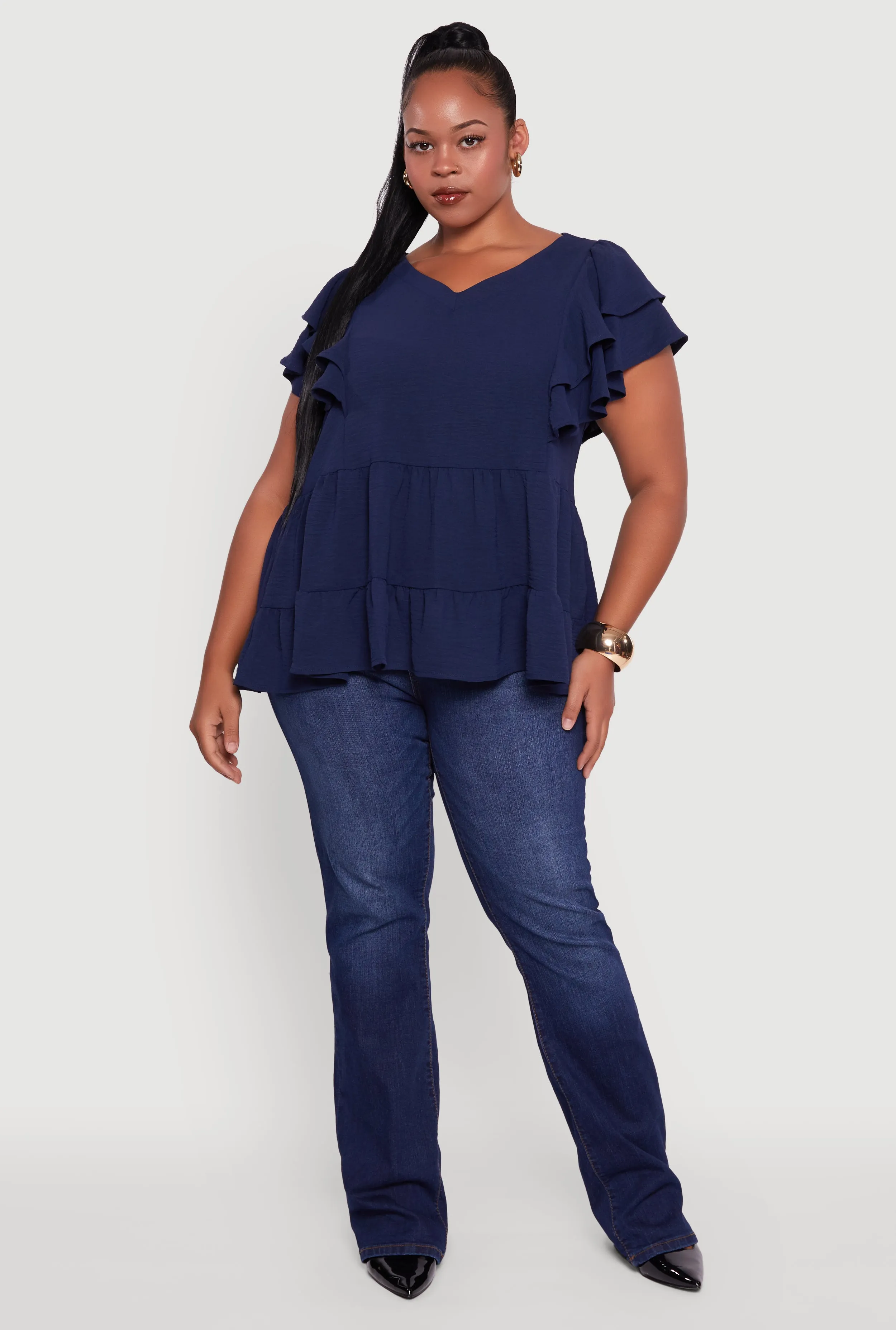 Plus Size Crepe Knit V-Neck Ruffle Tiered Blouse sold by Rainbow