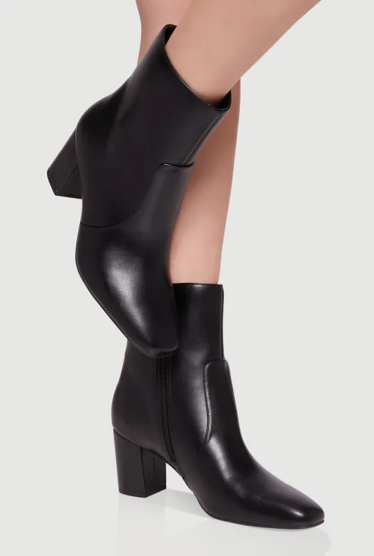 Almond Toe Mid Block Heel Booties sold by Rainbow