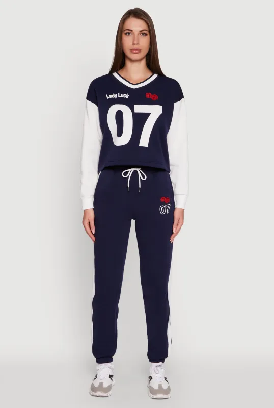 Graphic Side Stripe Tapered Leg Sweatpants sold by Rainbow