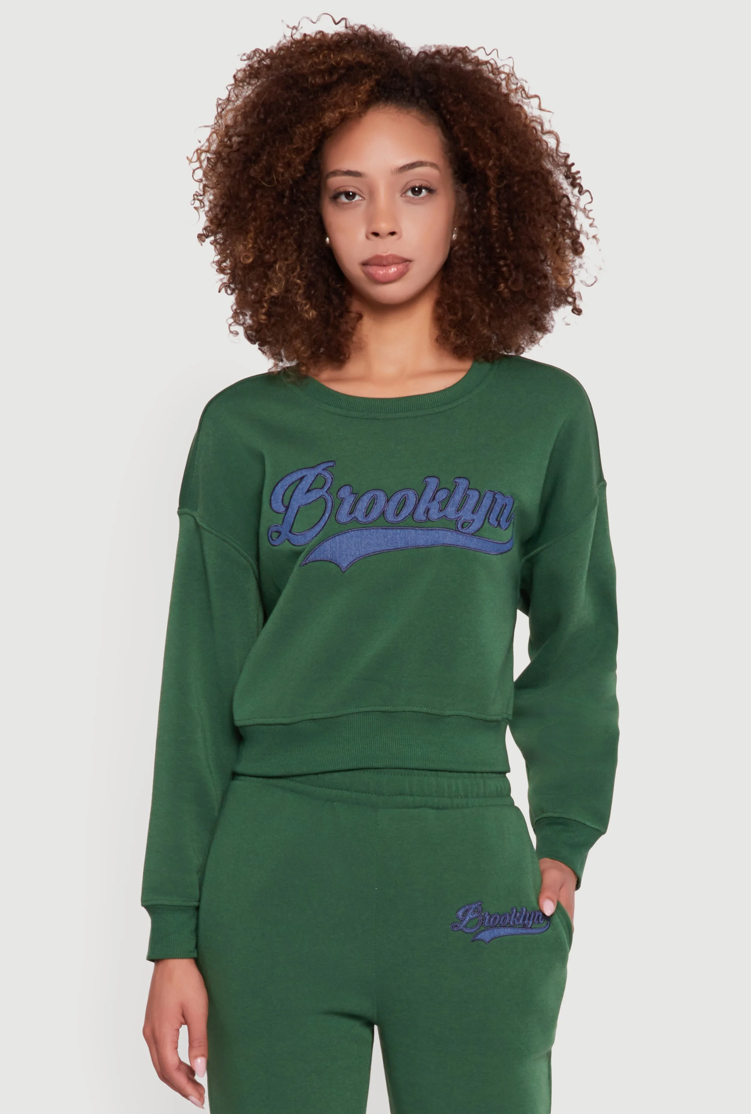 Embroidered Graphic Fleece Lined Sweatshirt sold by Rainbow
