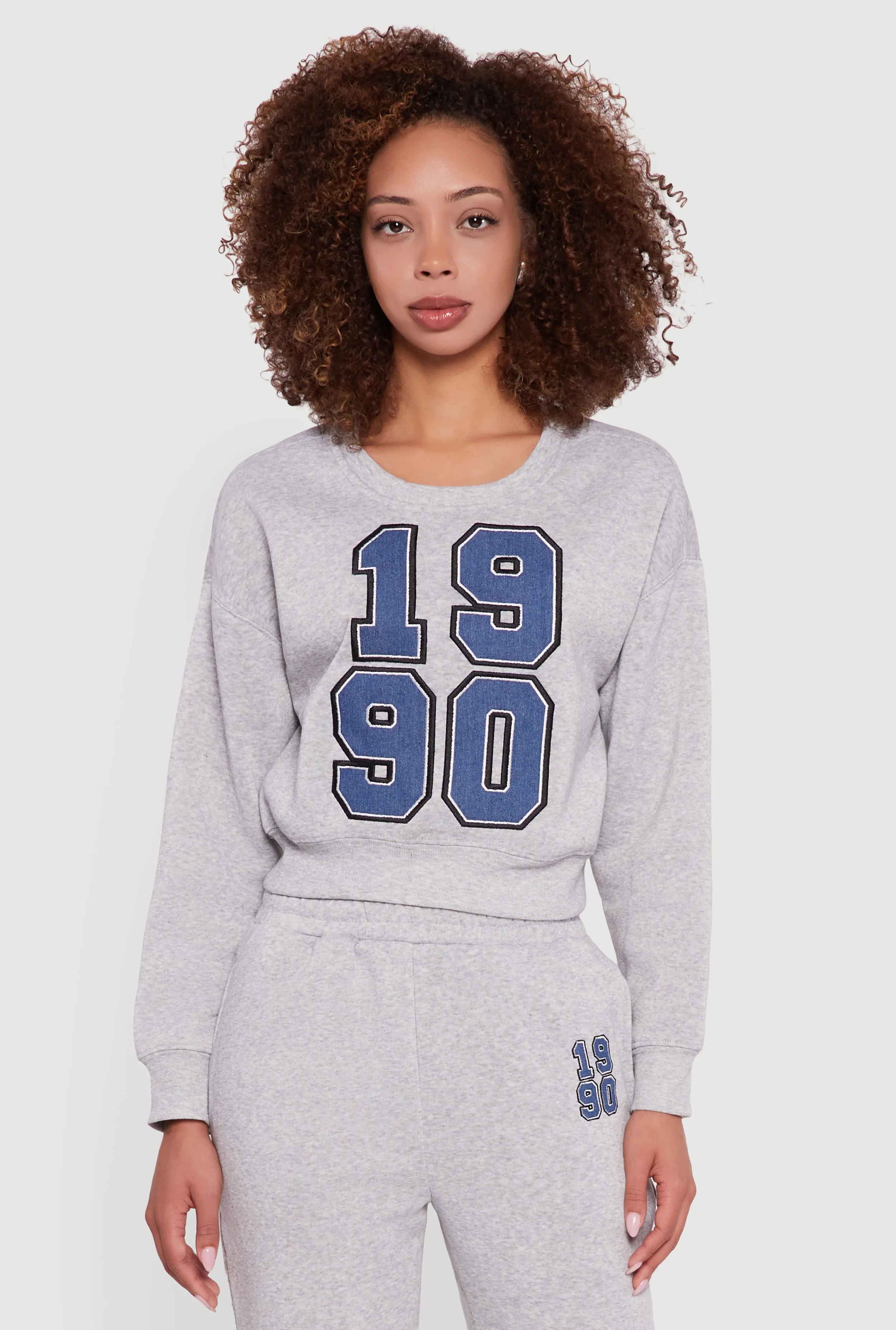 Embroidered Graphic Fleece Lined Sweatshirt sold by Rainbow