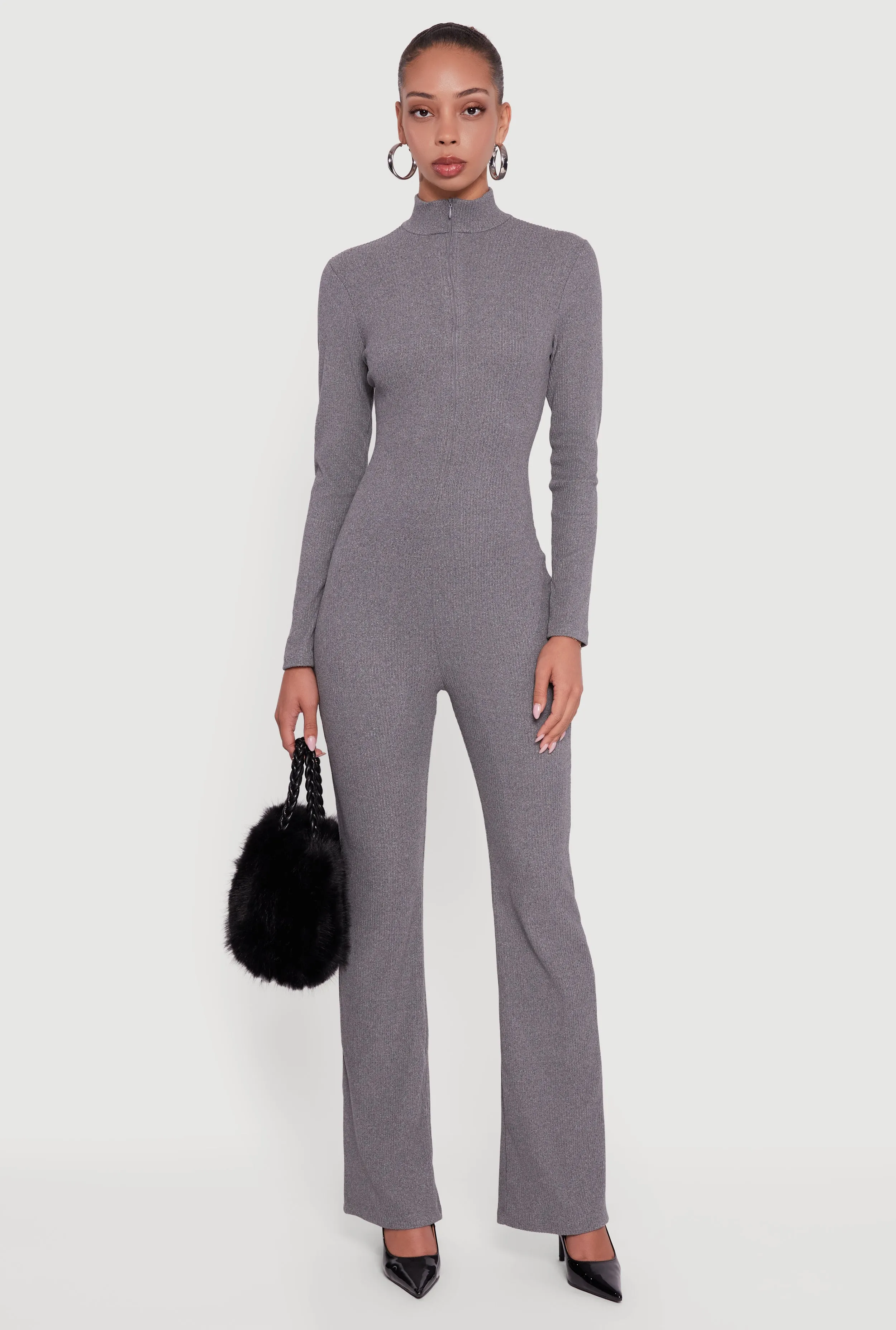 Ribbed Knit Zip Front Mock Neck Jumpsuit sold by Rainbow