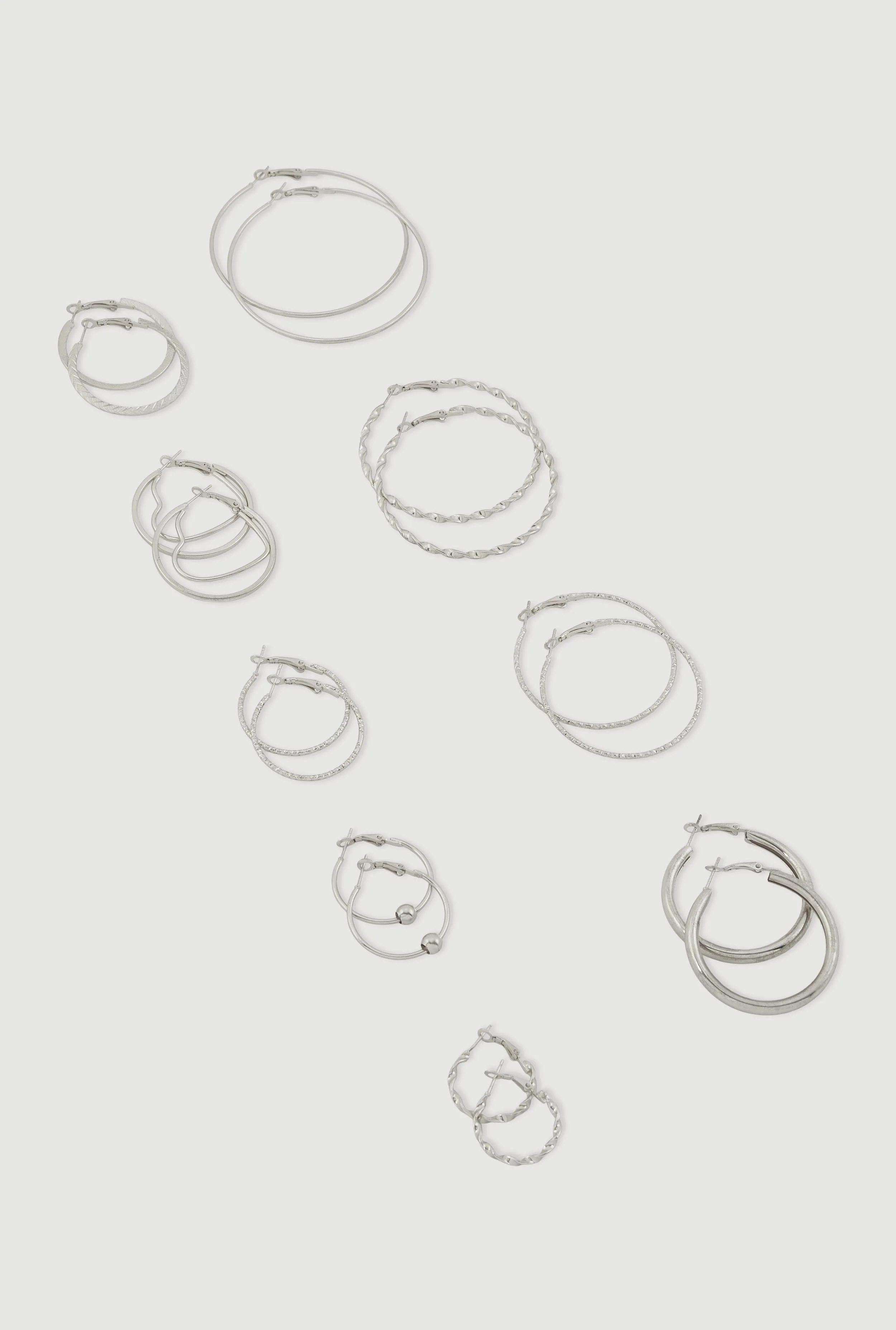 Assorted Metallic Hoop Earrings Set of 9 sold by Rainbow
