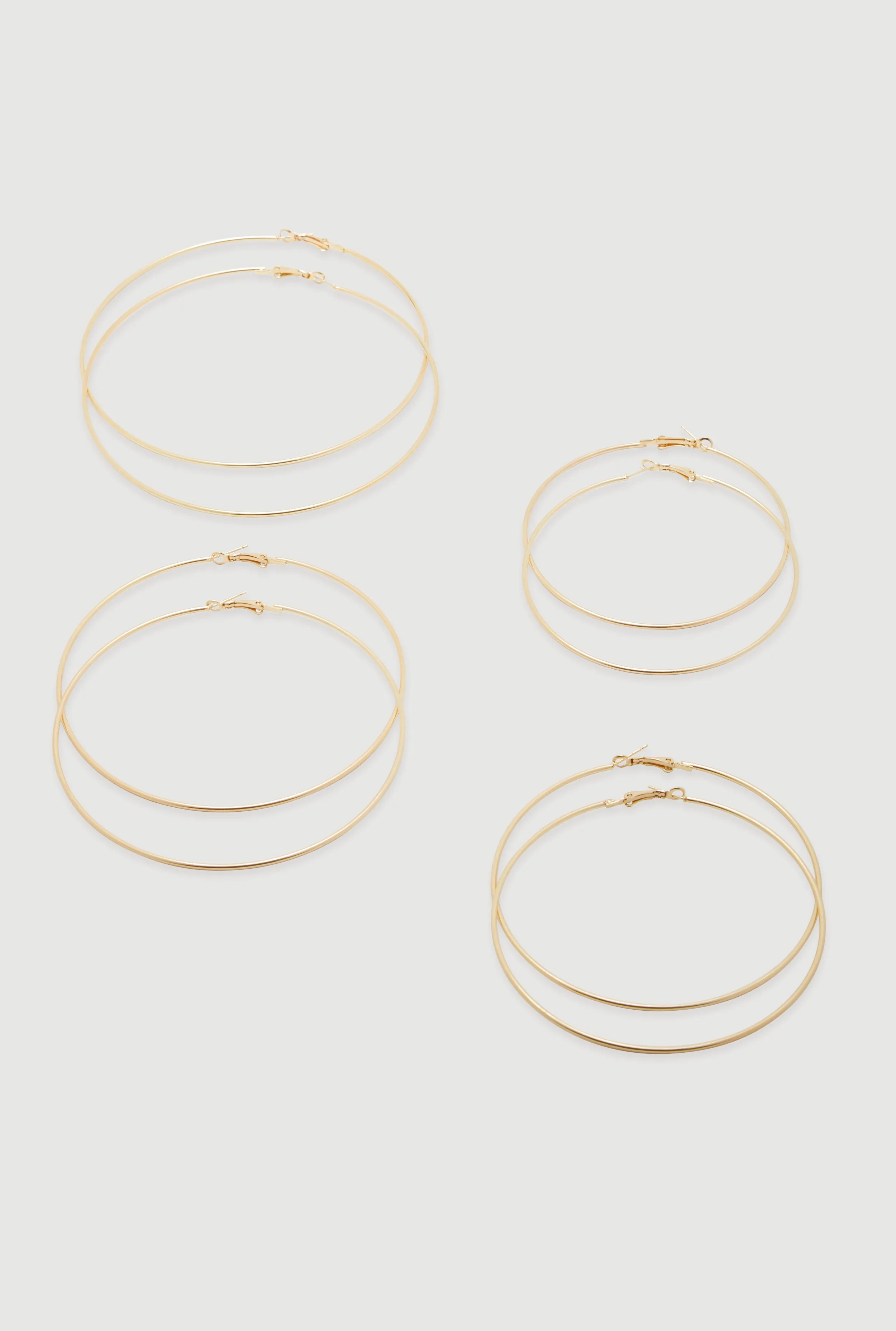 Thin Metallic Hoop Earrings Set of 4 sold by Rainbow