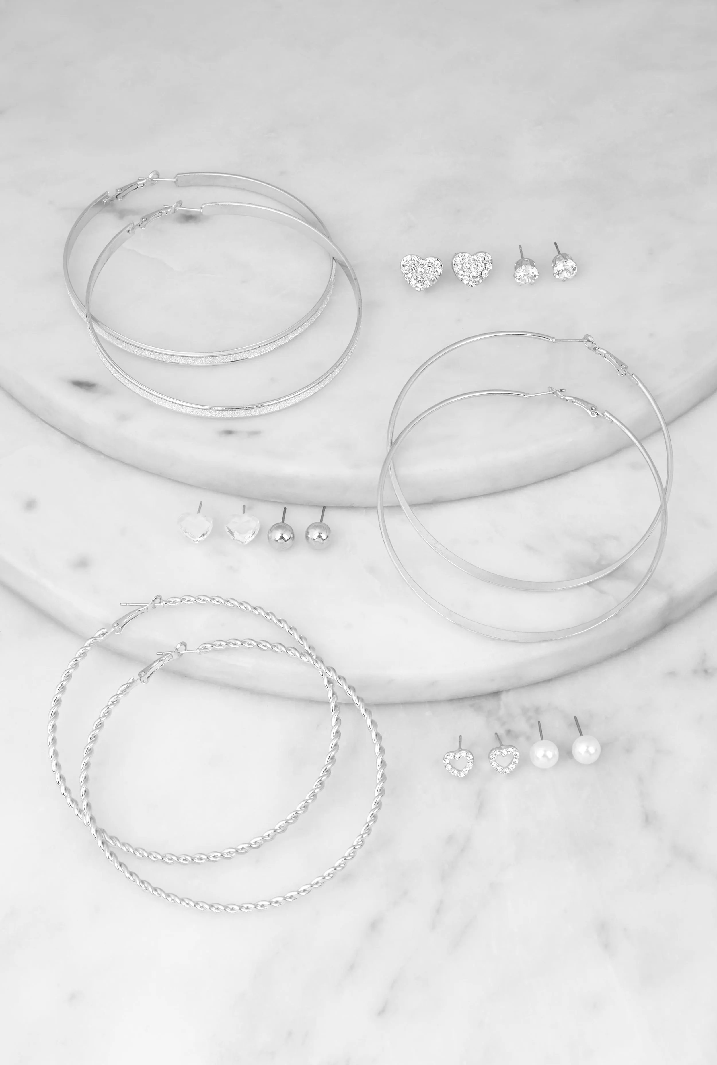 Assorted Stud and Hoop Earrings Set of 9 sold by Rainbow