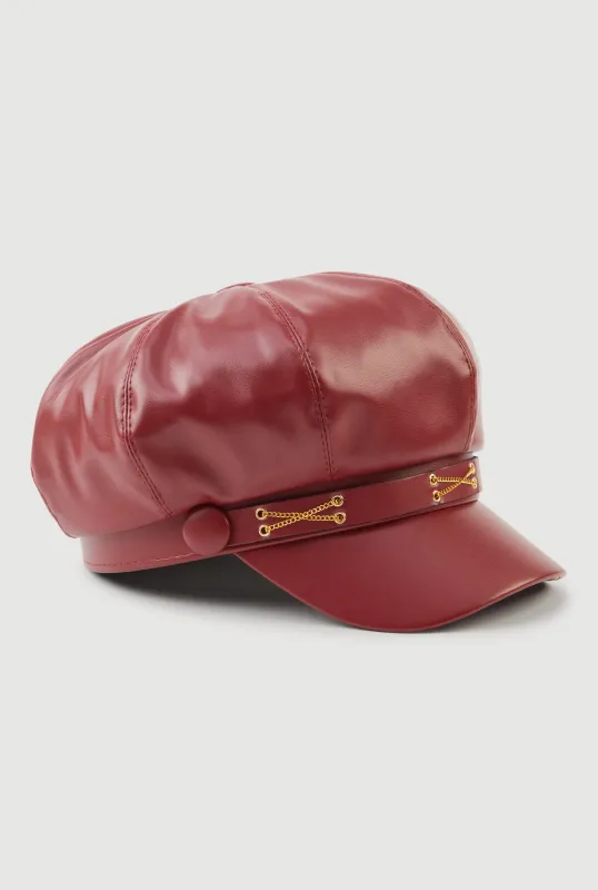 Faux Leather Criss Cross Chain Detail Cabbie Hat sold by Rainbow