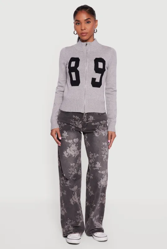 89 Graphic Mock Neck Zip Front Cardigan sold by Rainbow