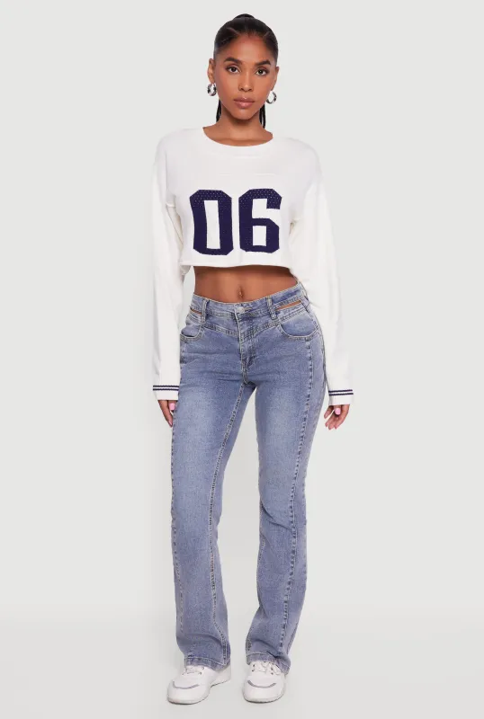 06 Graphic Varsity Stripe Detail Cropped Sweater sold by Rainbow