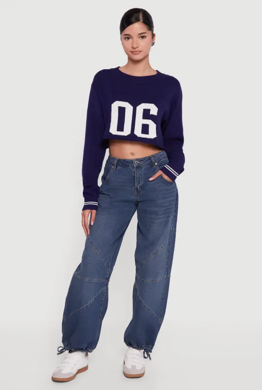 06 Graphic Varsity Stripe Detail Cropped Sweater sold by Rainbow