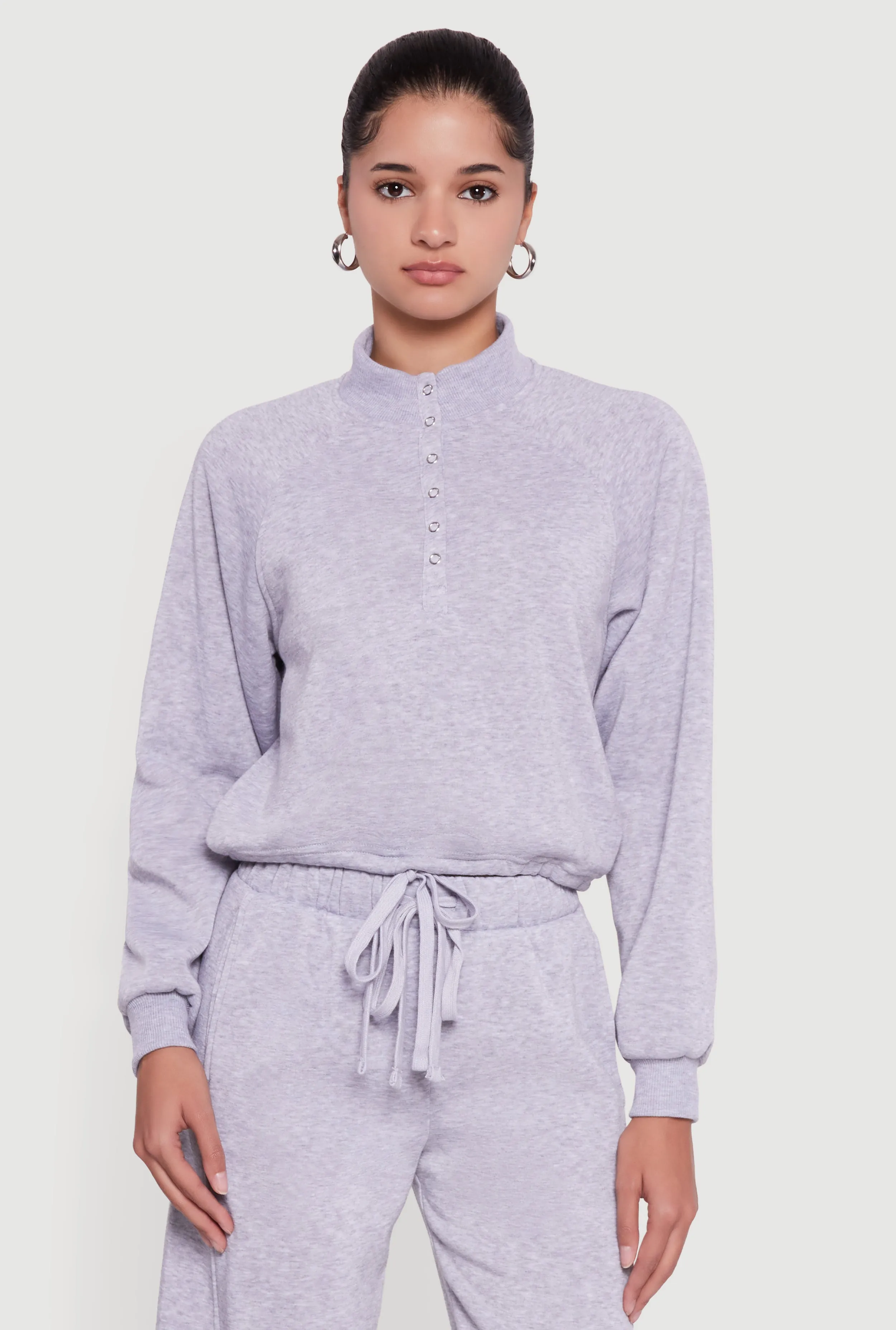 Almost Famous Drawstring Hem Cropped Raglan Sweatshirt sold by Rainbow