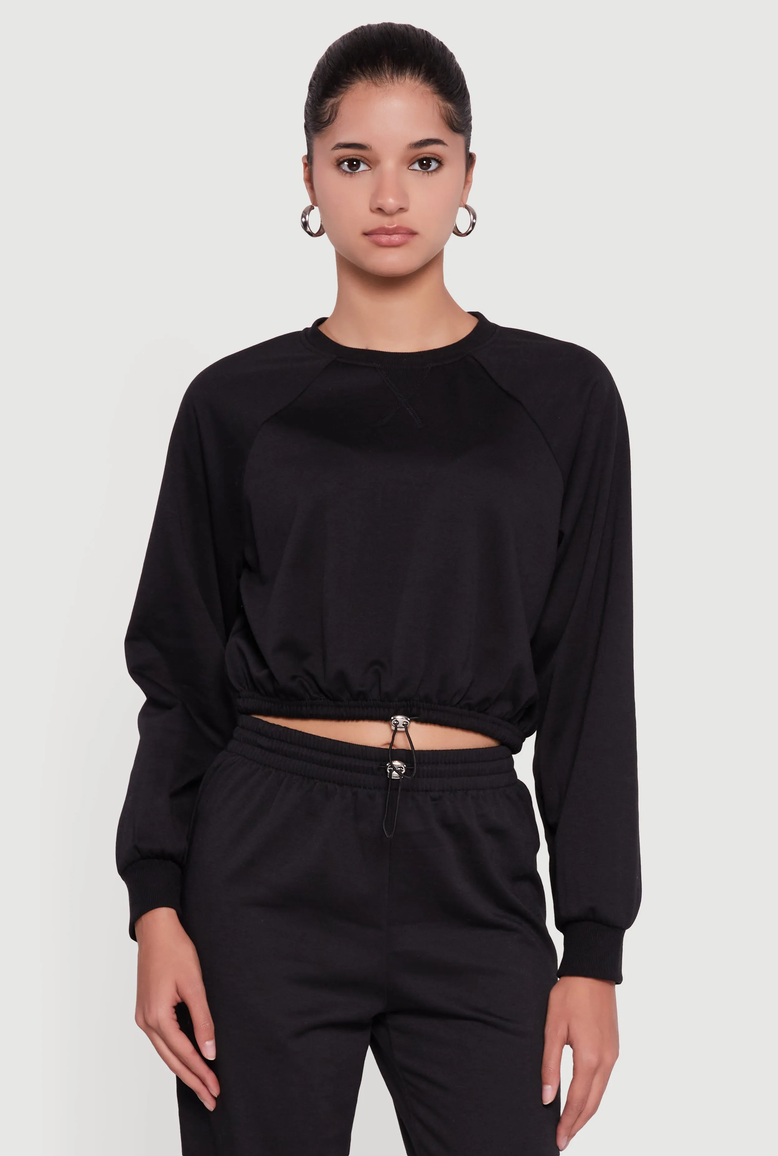 Almost Famous Toggle Drawstring Hem Cropped Raglan Sweatshirt sold by Rainbow product image thumbnail 2