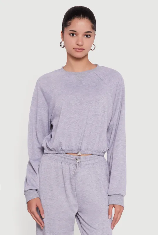 Almost Famous Toggle Drawstring Hem Cropped Raglan Sweatshirt sold by Rainbow