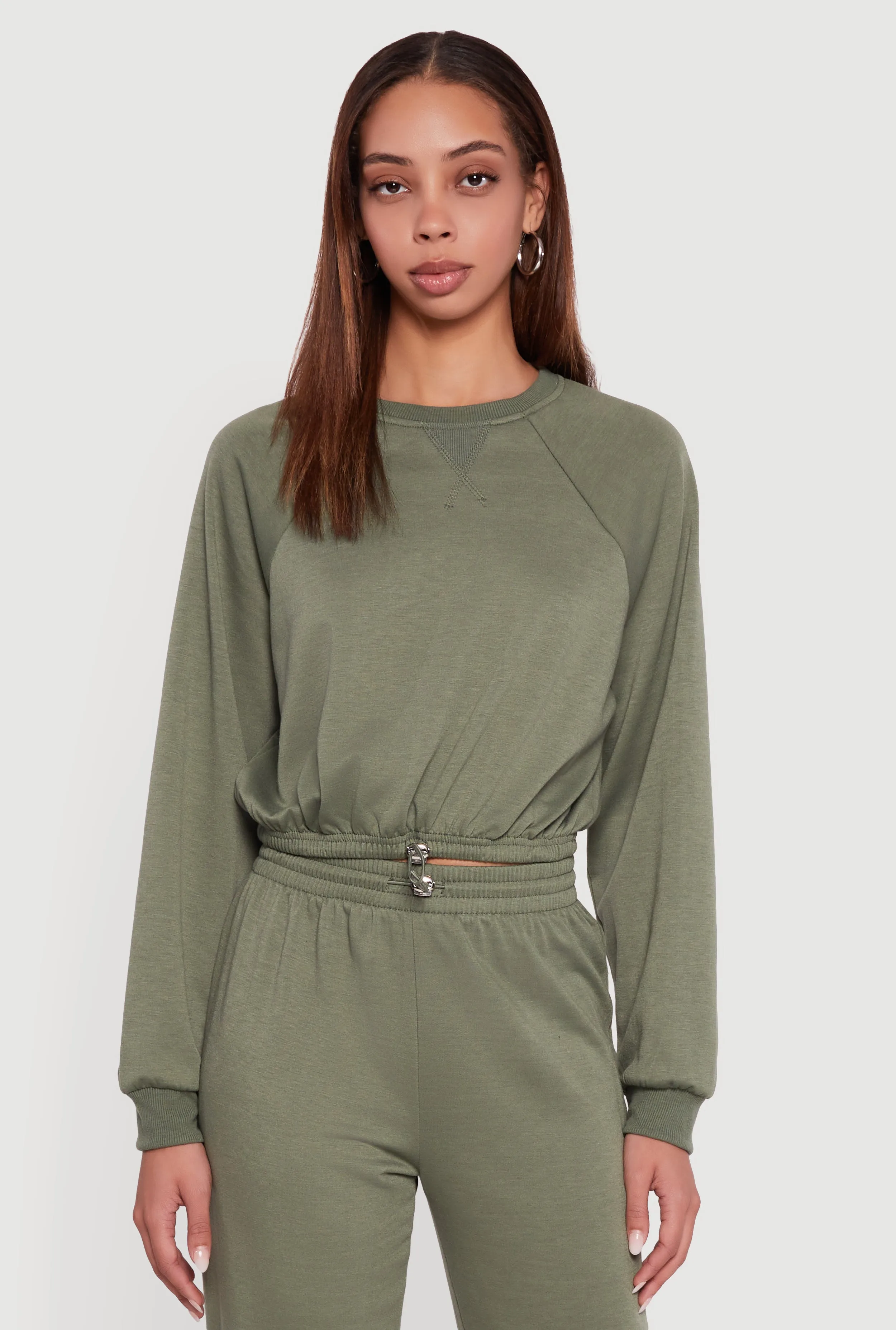 Almost Famous Toggle Drawstring Hem Cropped Raglan Sweatshirt sold by Rainbow product image thumbnail 3