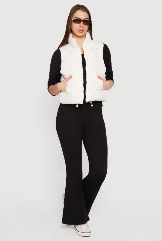 Almost Famous Quilted Puffer Vest with Bows sold by Rainbow