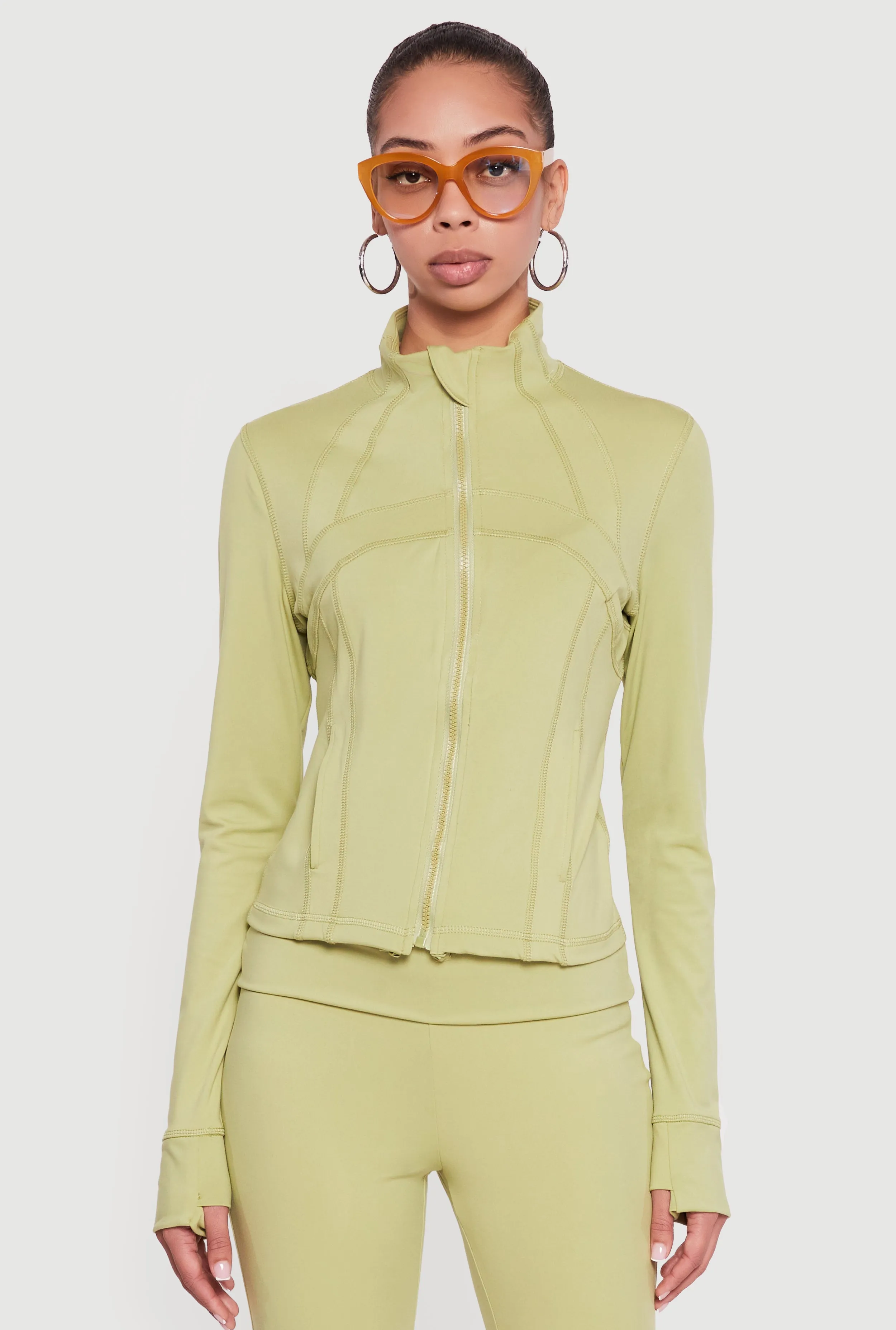 Solid Long Sleeve Mock Neck Zip Front Active Jacket sold by Rainbow