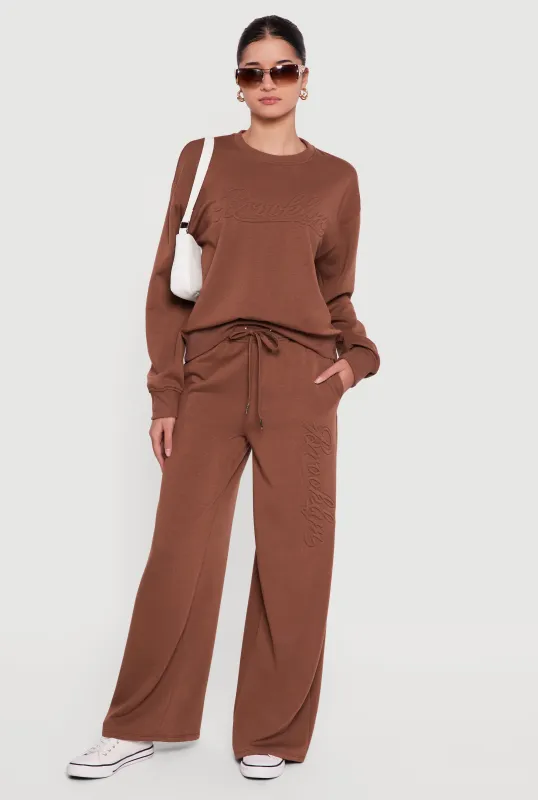 Brooklyn Embosses Graphic High Waisted Sweatpants sold by Rainbow
