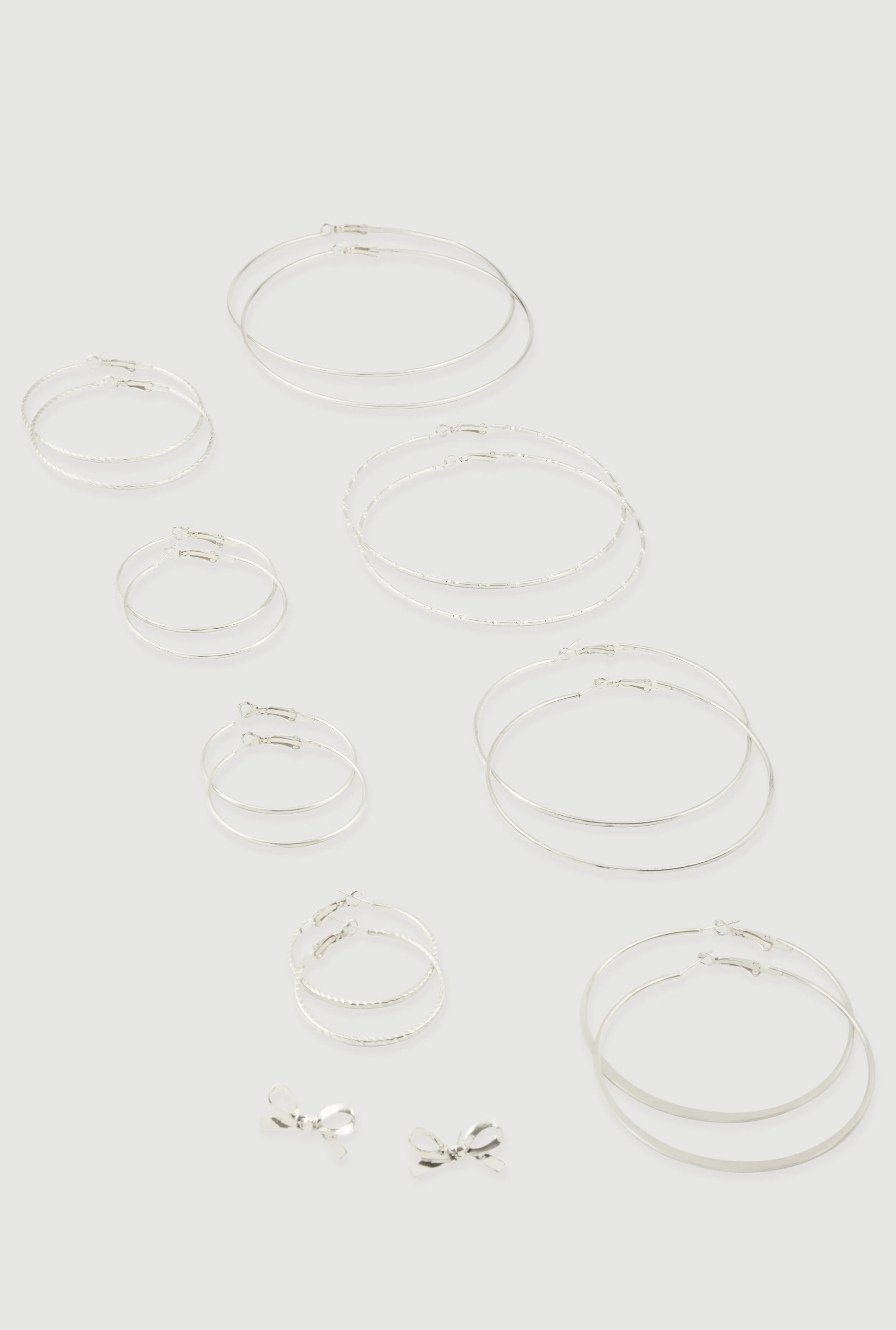 Assorted Hoop and Bow Stud Earrings Set of 9 sold by Rainbow