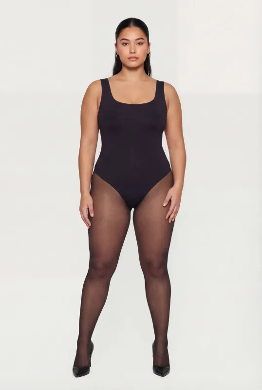 Plus Size Sleeveless Bodysuit sold by Rainbow