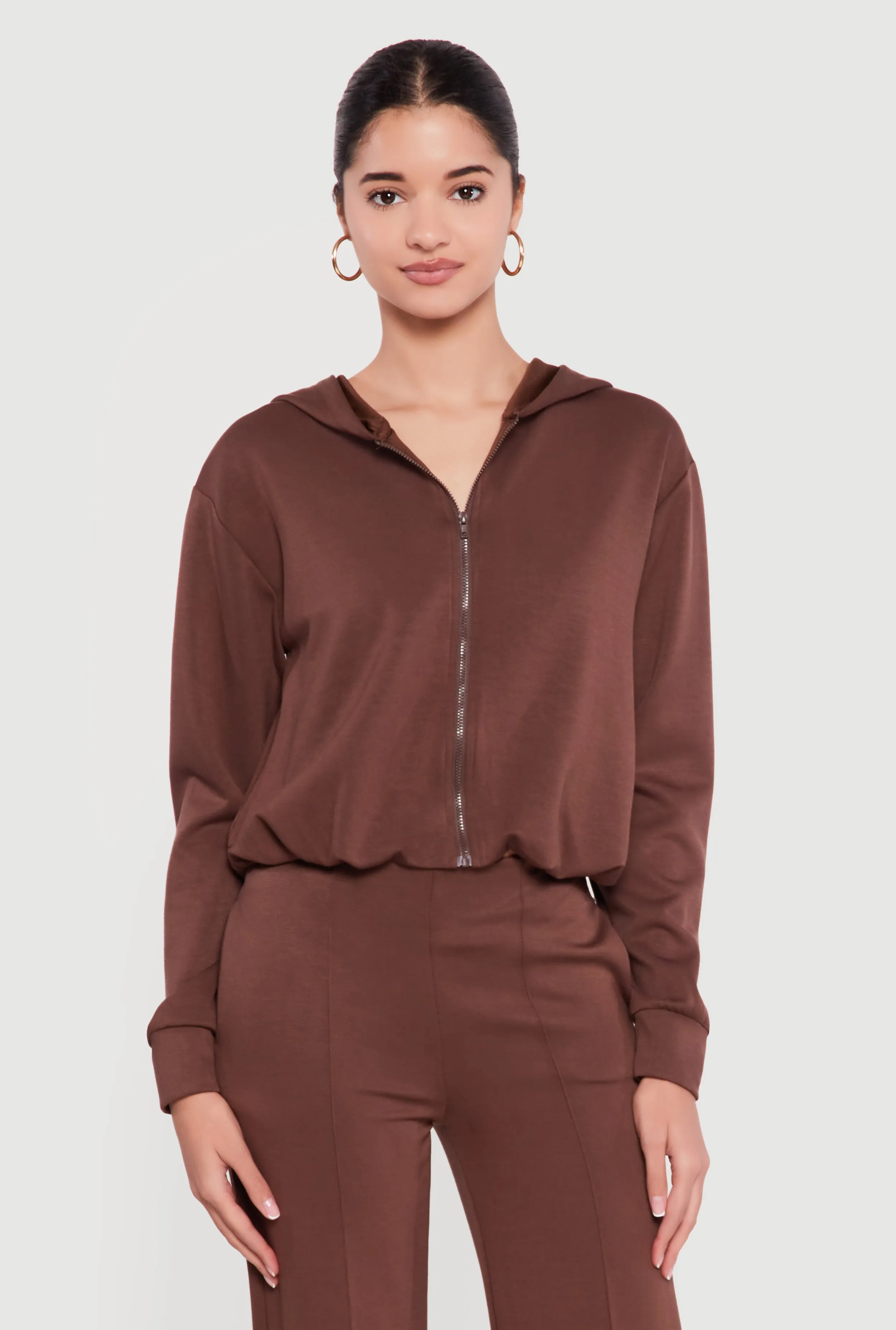 Zip Front Bubble Hem Hooded Sweatshirt sold by Rainbow