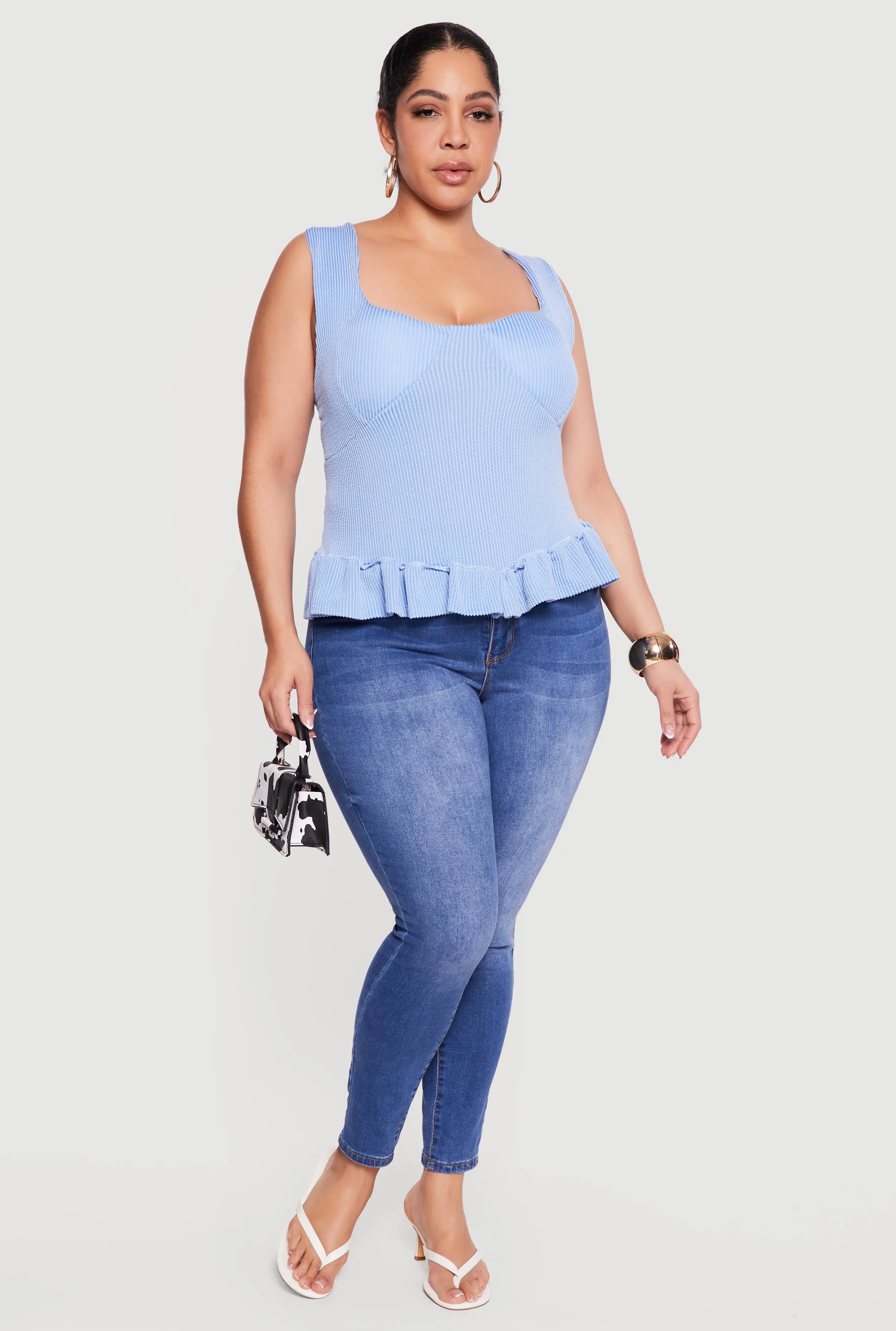 Plus Size Sleeveless Rib Knit Ruffle Hem Top sold by Rainbow