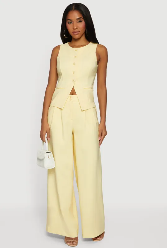 Two Button Pleated Wide Leg Trousers sold by Rainbow