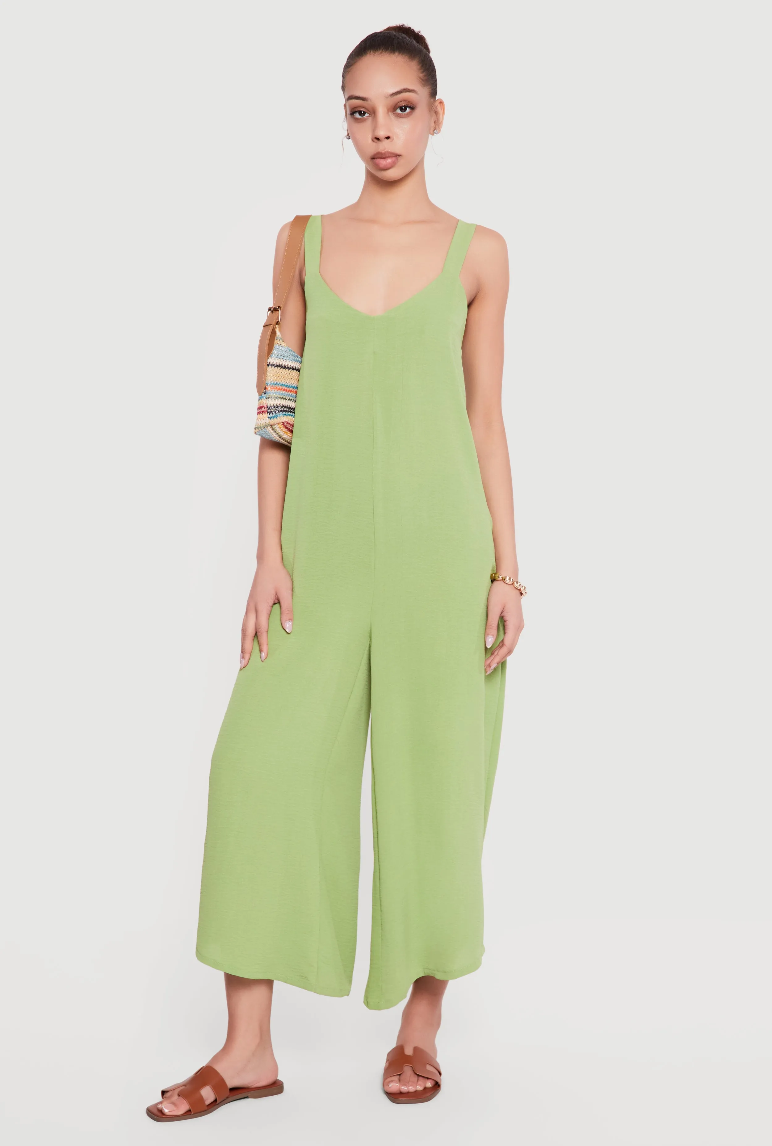 Sleeveless V Neck Crepe Knit Wide Leg Jumpsuit sold by Rainbow