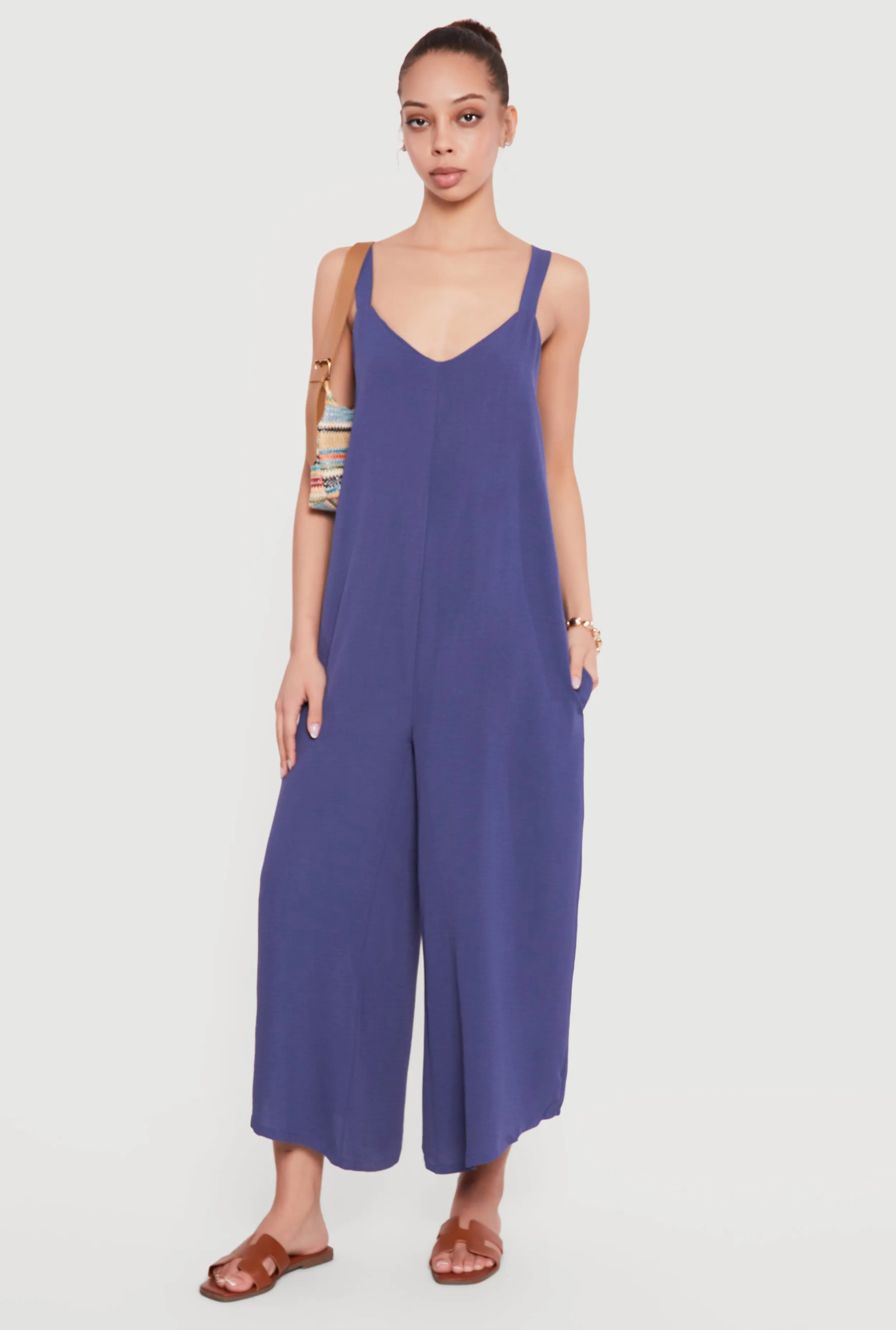 Sleeveless V Neck Crepe Knit Wide Leg Jumpsuit sold by Rainbow