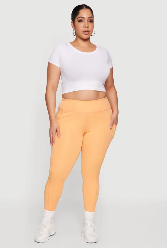 Plus Size Solid High Waisted Leggings with Cell Phone Pockets sold by Rainbow