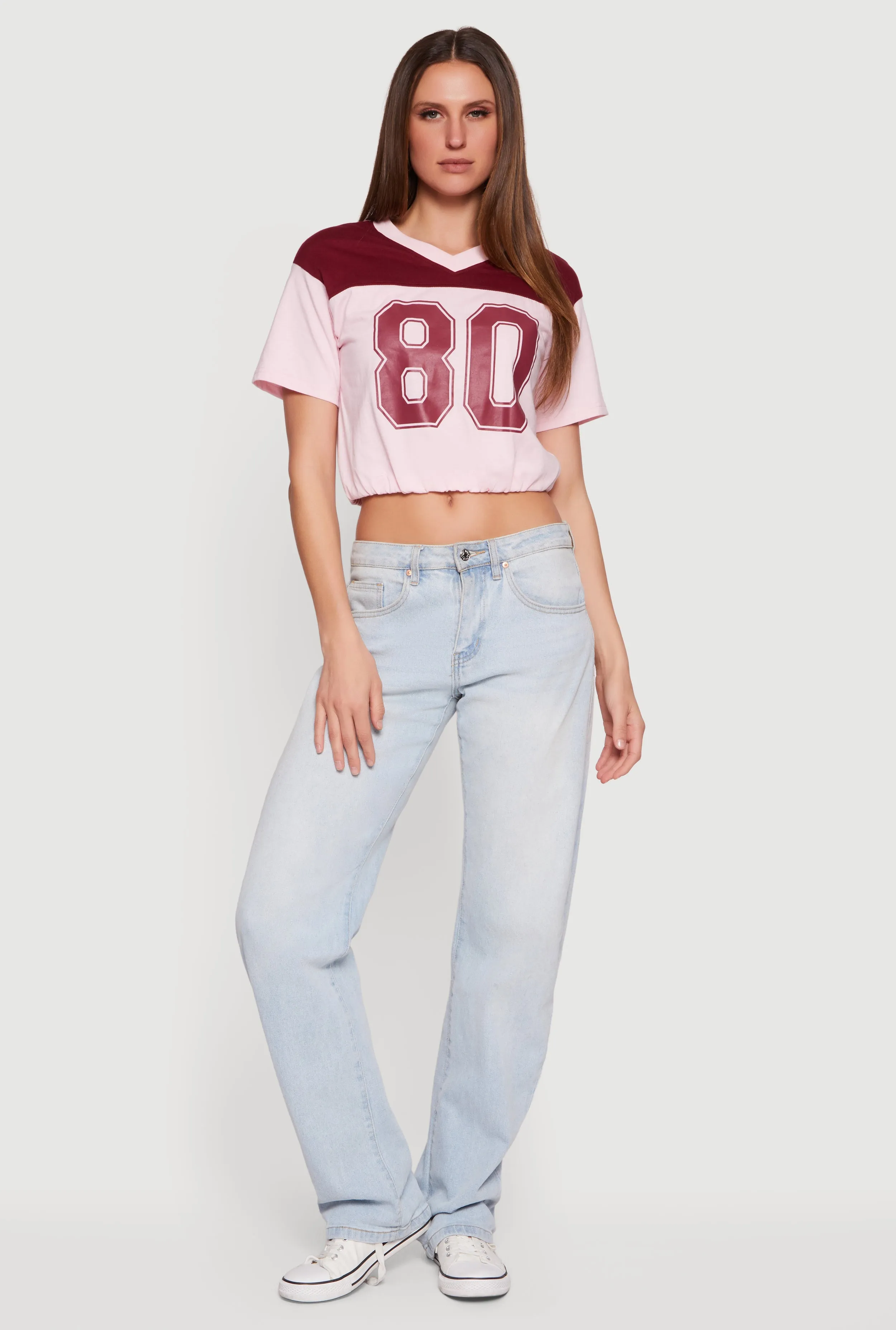 Almost Famous V-Neck Football Cropped T-Shirt sold by Rainbow