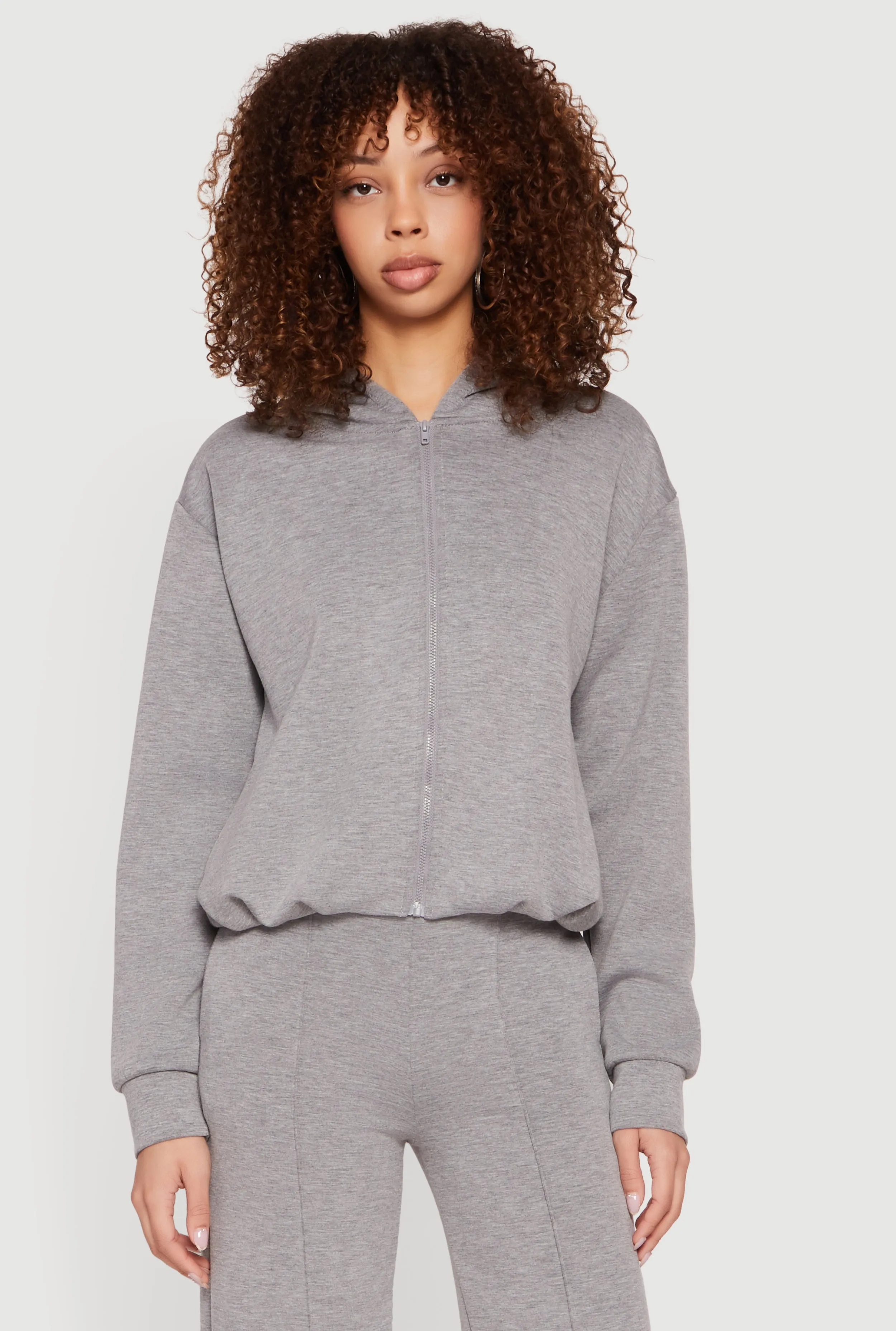Zip Front Bubble Hem Hooded Sweatshirt sold by Rainbow