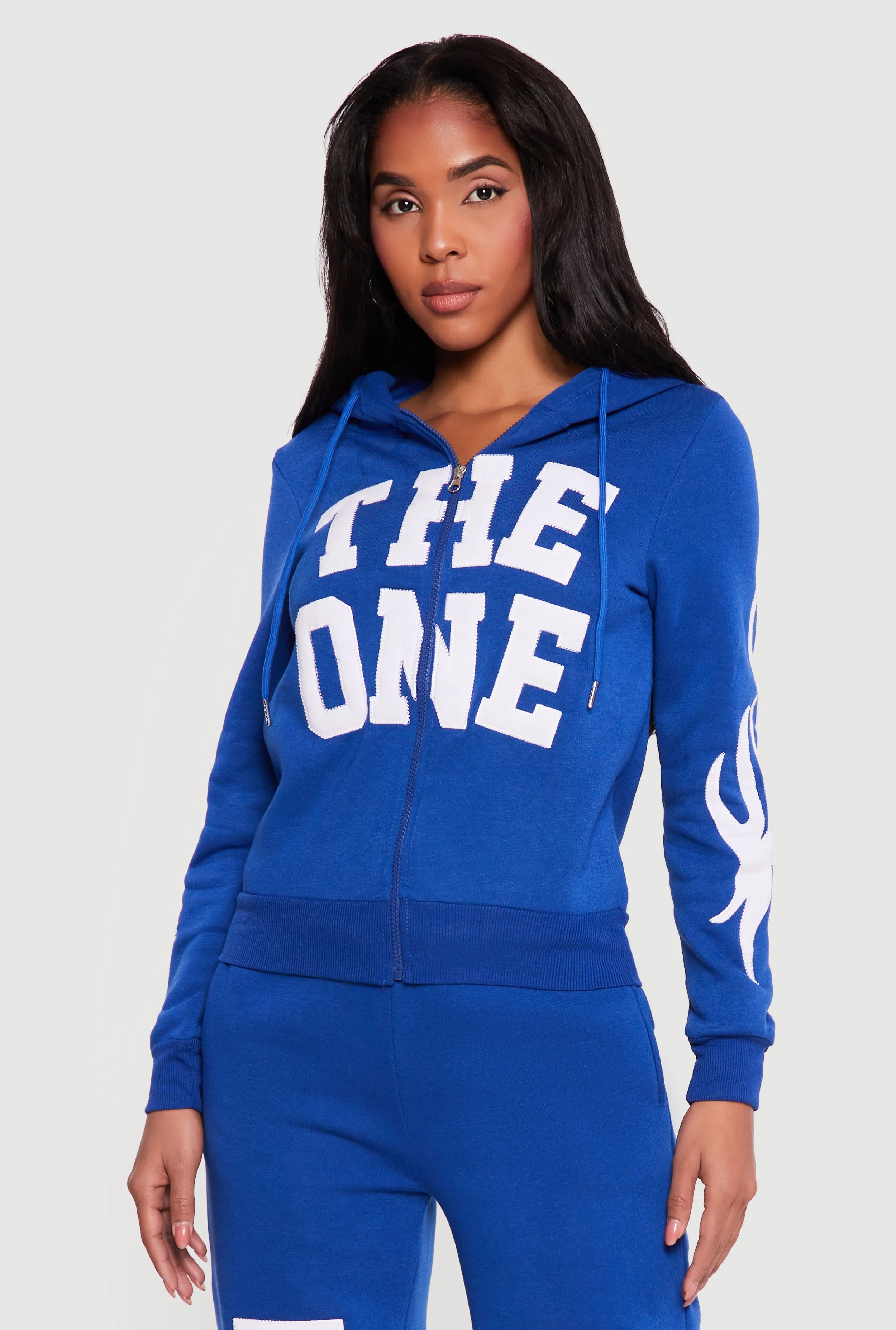 The One Graphic Patch Zip Front Hoodie sold by Rainbow