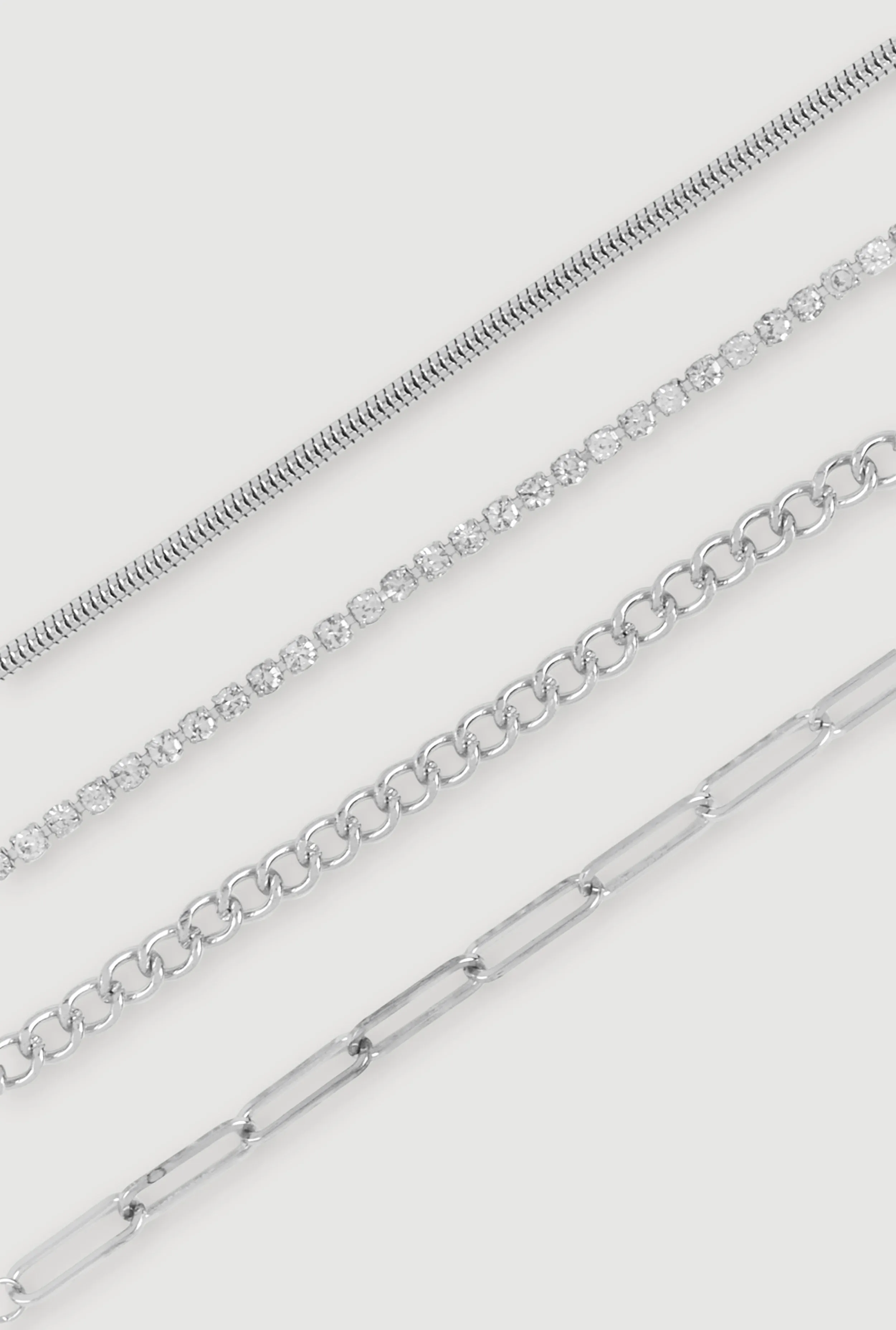 Cubic Zirconia Assorted Link Chain Anklet Set of 4 sold by Rainbow