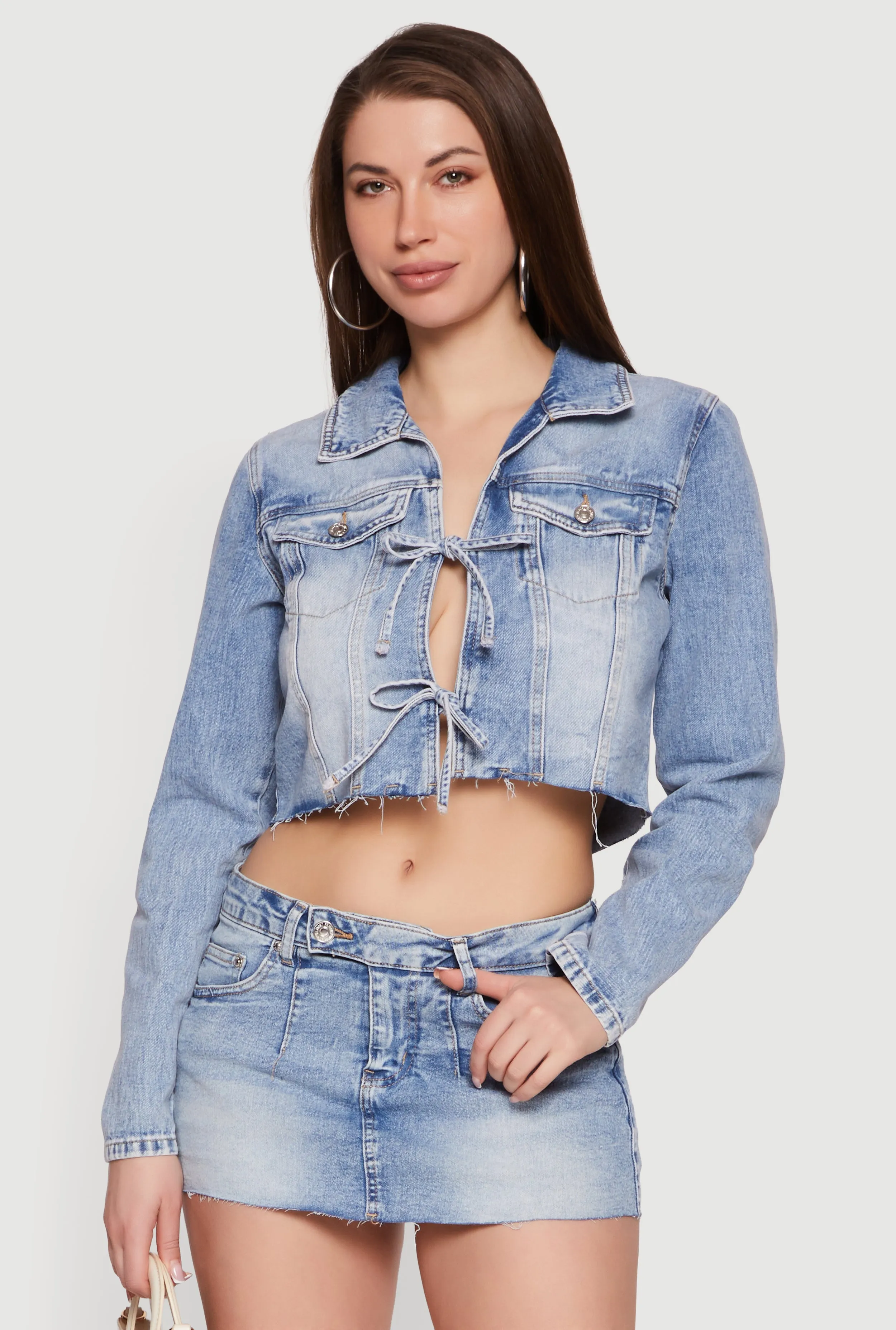 Almost Famous Double Tie Front Cropped Denim Jacket sold by Rainbow