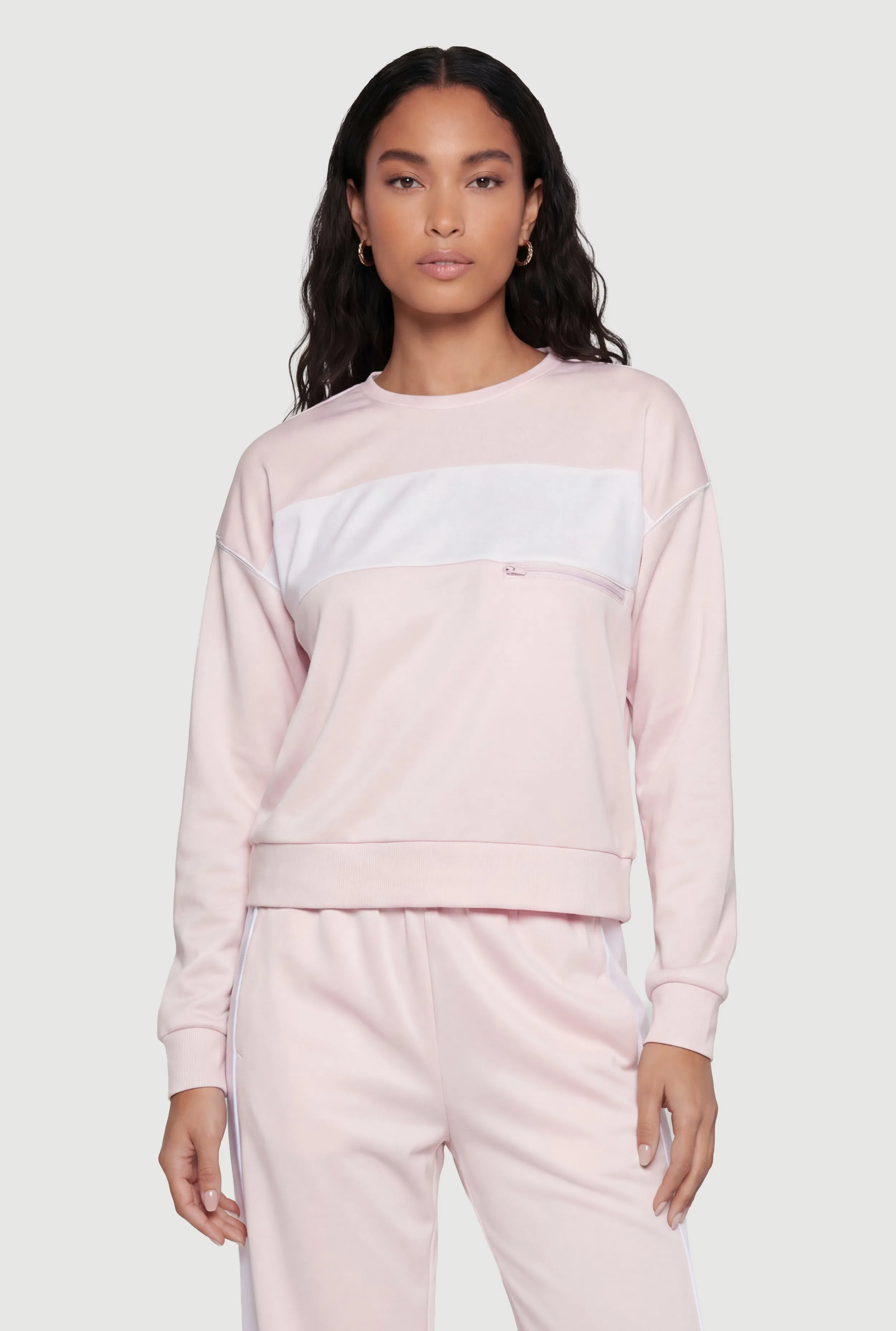 Crew Neck Pullover Top with Zip Pocket Detail sold by Rainbow