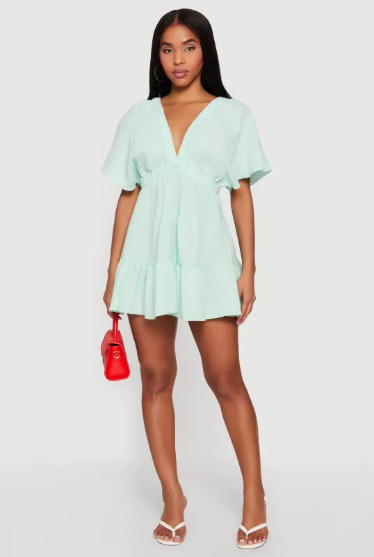 Gauze Knit Plunge Neck Tiered Mini Dress made by Rainbow