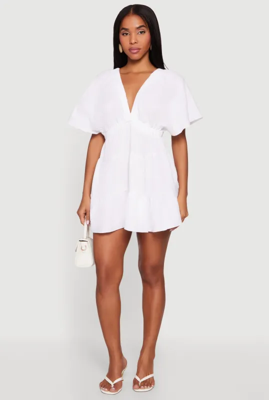 Gauze Knit Plunge Neck Tiered Mini Dress made by Rainbow