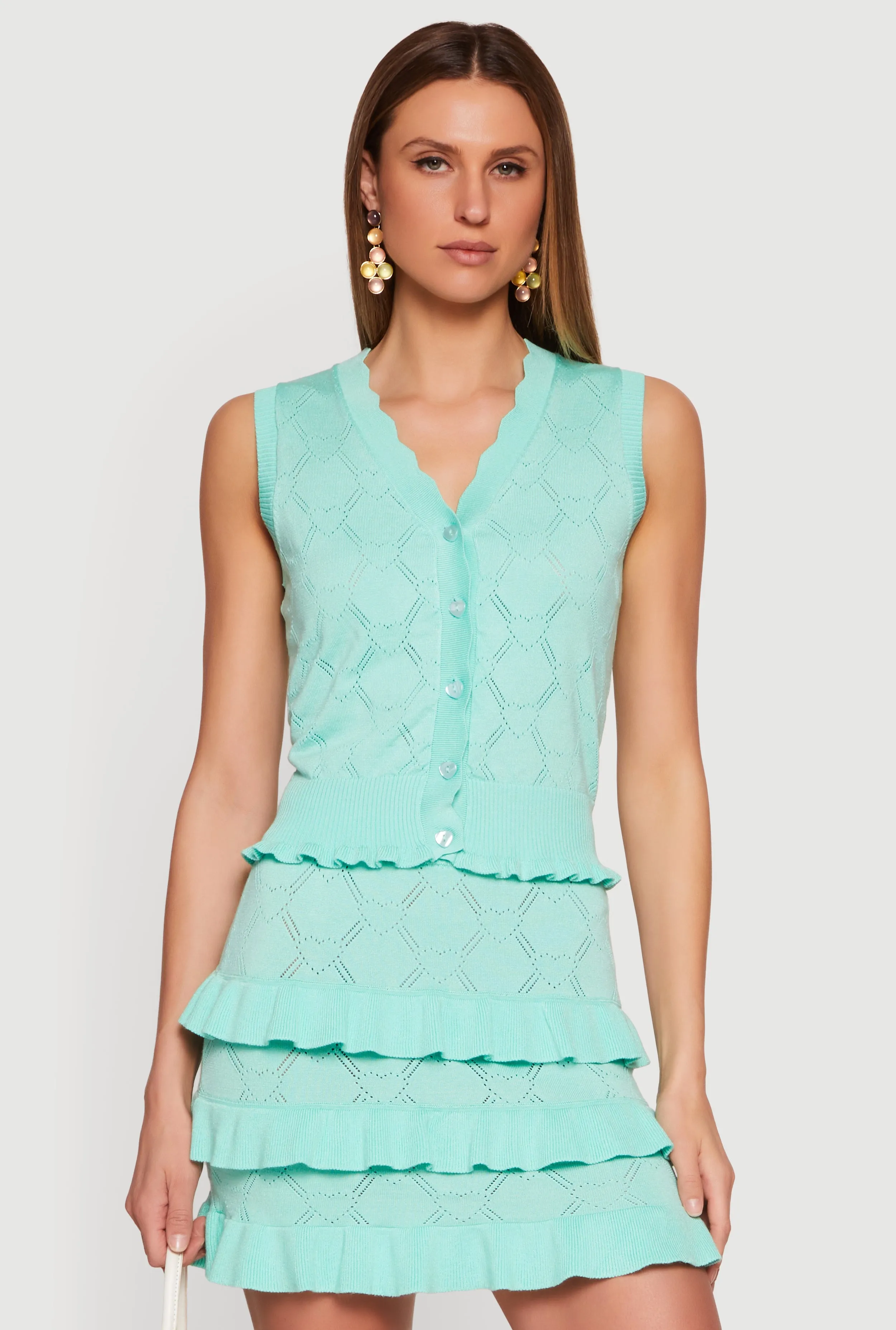 Almost Famous Heart Textured Knit Button Front Vest sold by Rainbow