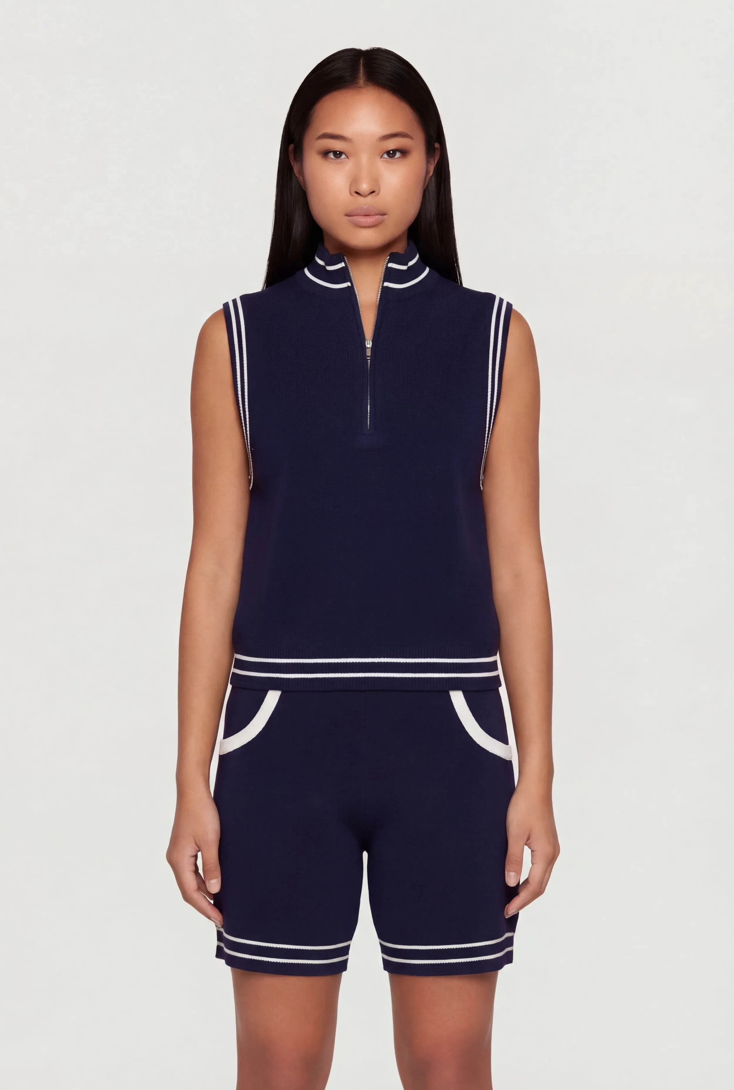 Varsity Stripe Half Zip Front Sleeveless Mock Neck Top sold by Rainbow