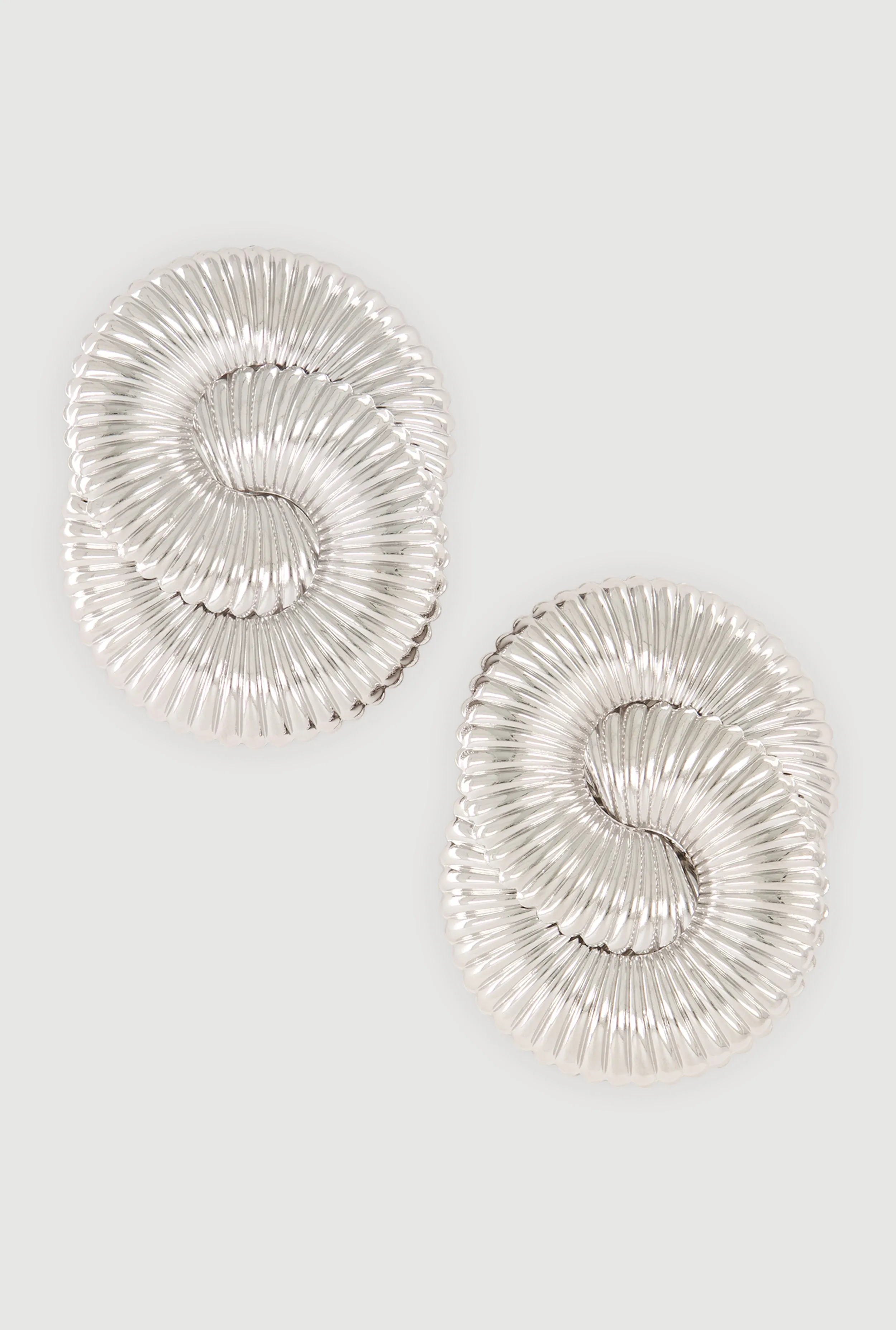 Intertwined Circle Sculptural Drop Earrings sold by Rainbow