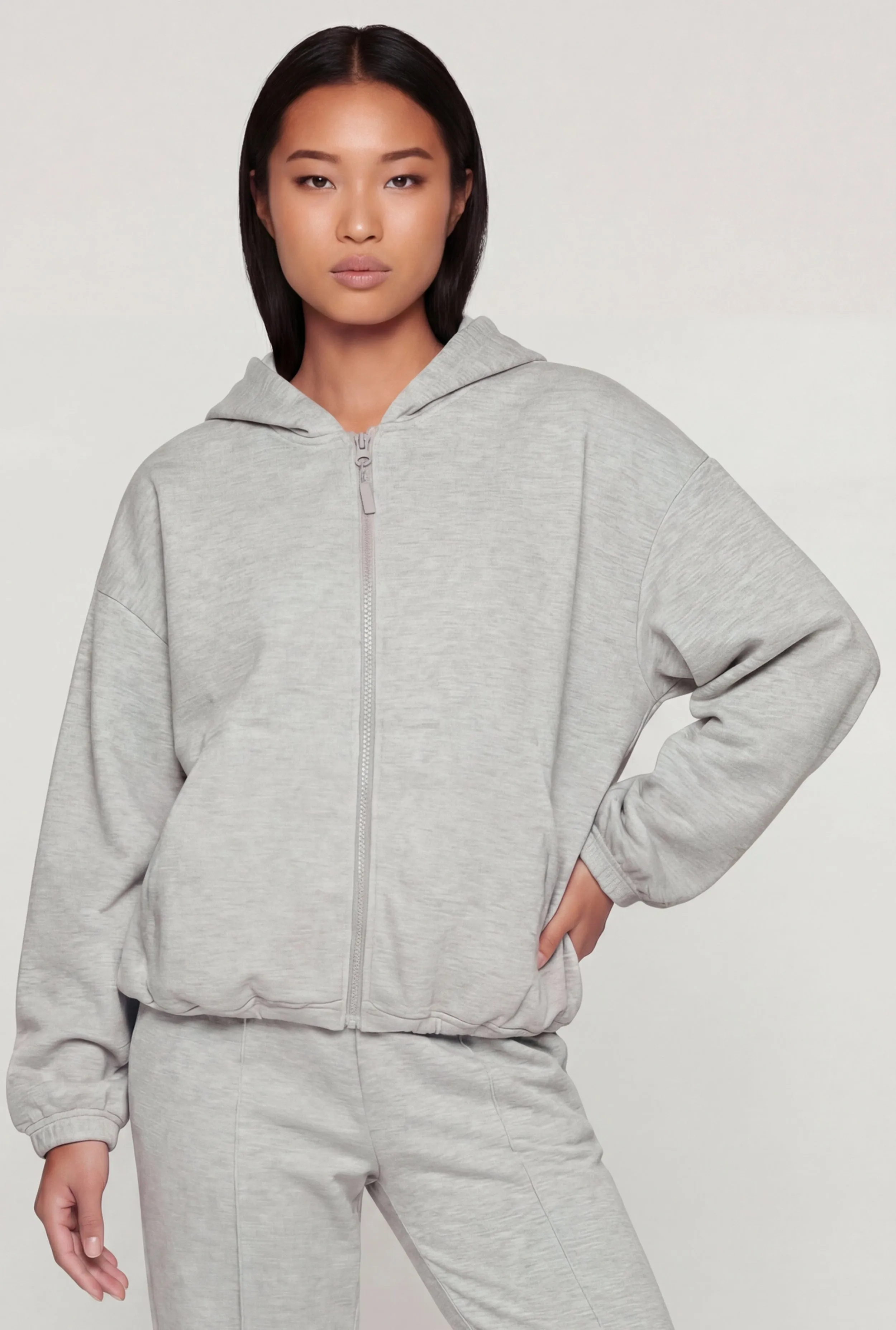 Zip Front Bubble Hem Hooded Sweatshirt sold by Rainbow