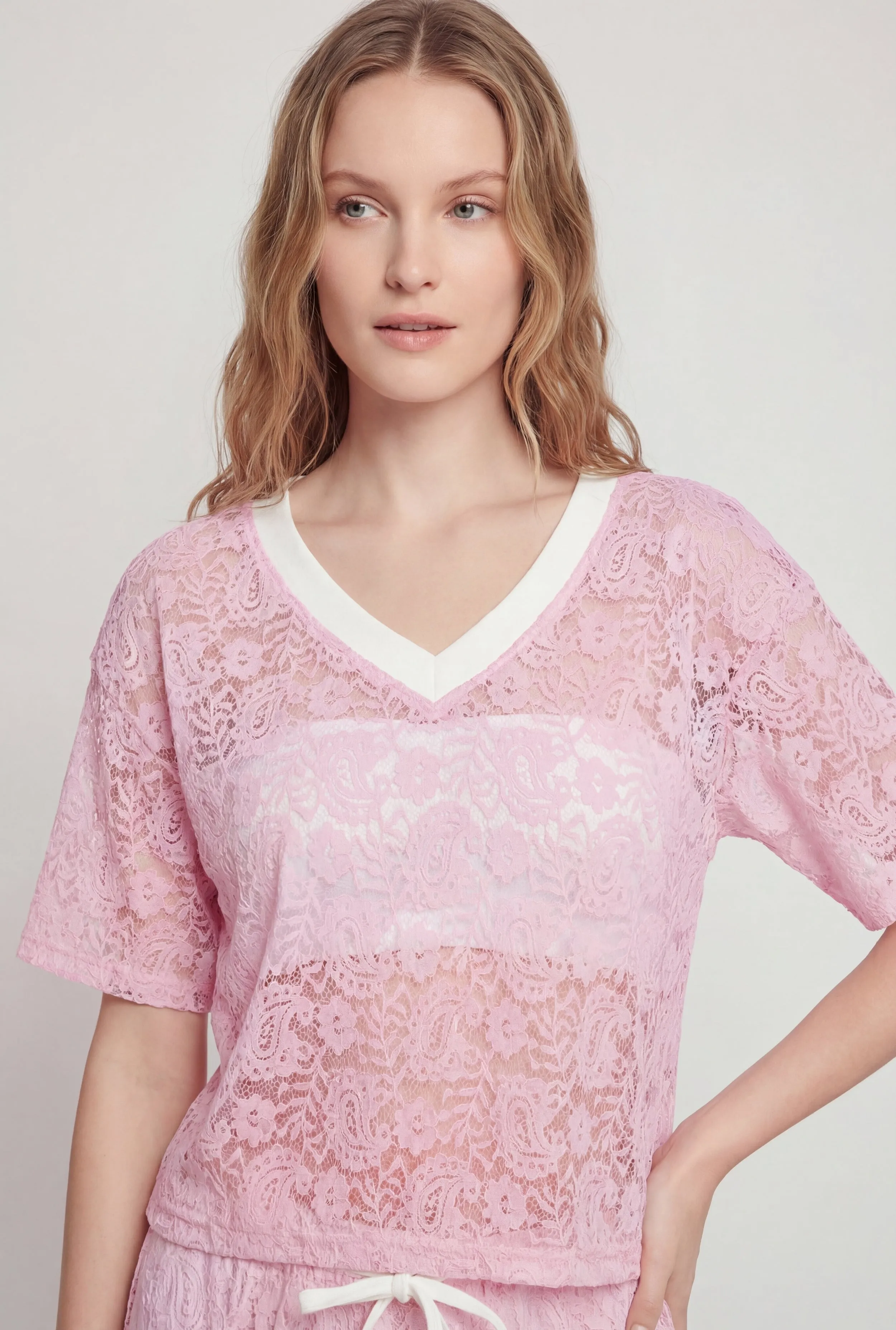 Almost Famous Lace Short Sleeve V-Neck Top sold by Rainbow