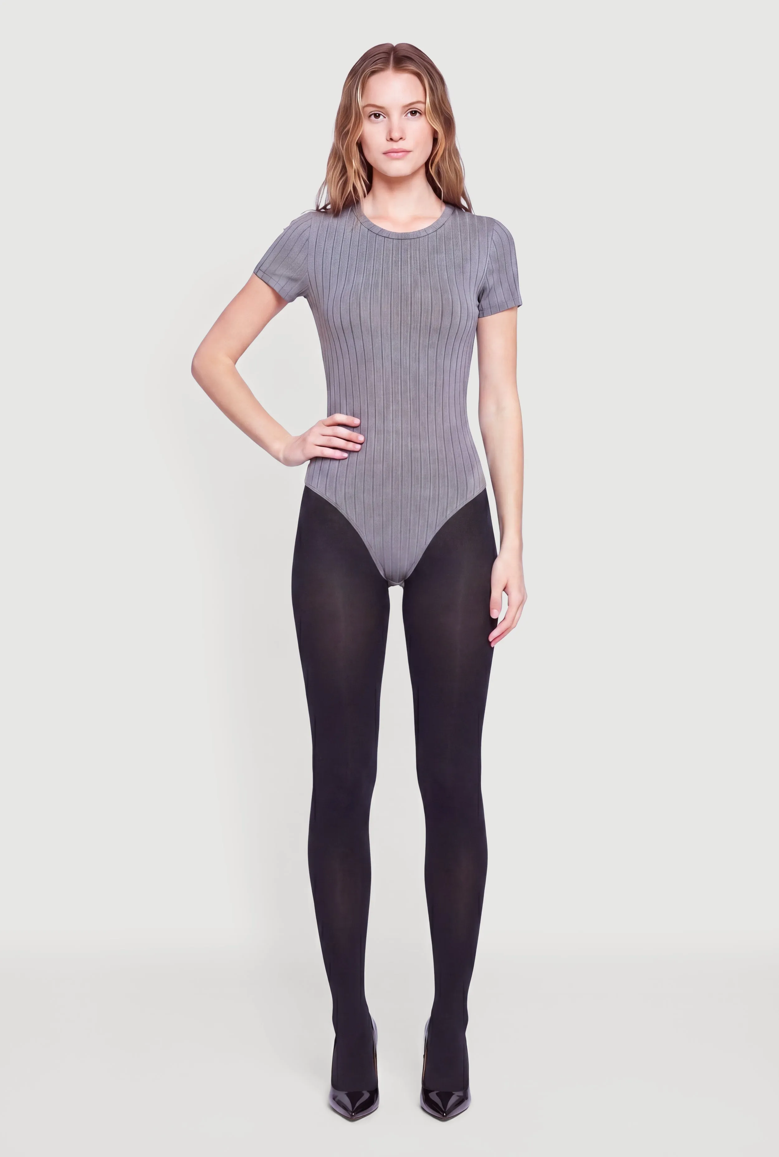 Ribbed Knit Solid Crew Neck Bodysuit sold by Rainbow