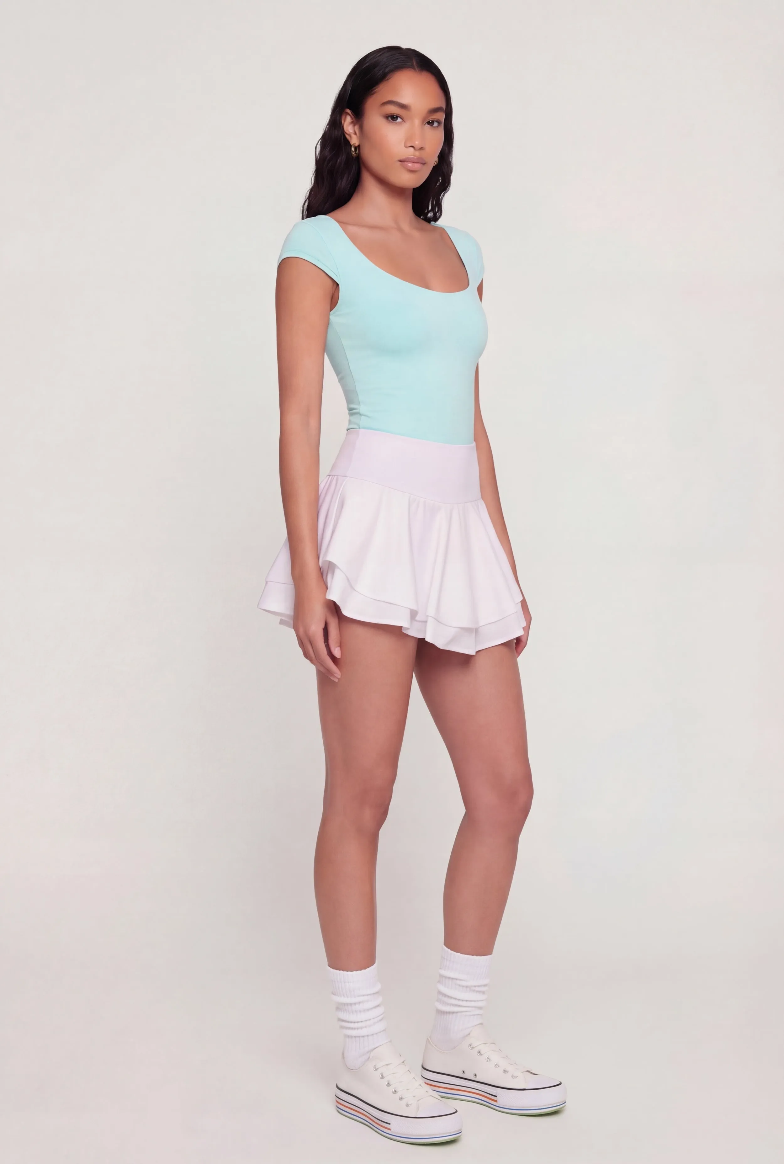 Mini Tiered Crepe Knit Skirt with Ruffles sold by Rainbow
