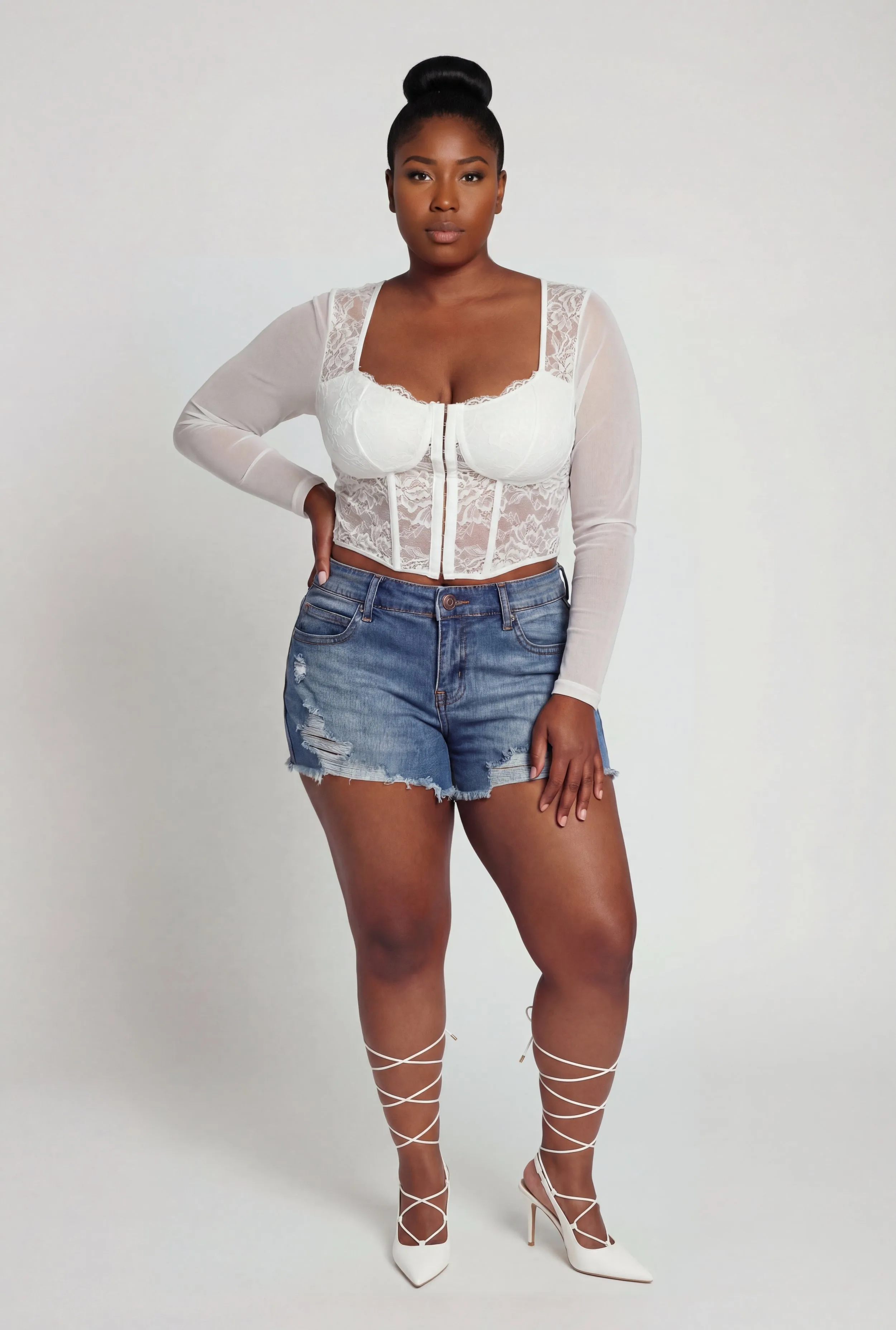 Plus Size Distressed Raw Hem Denim Shorts sold by Rainbow