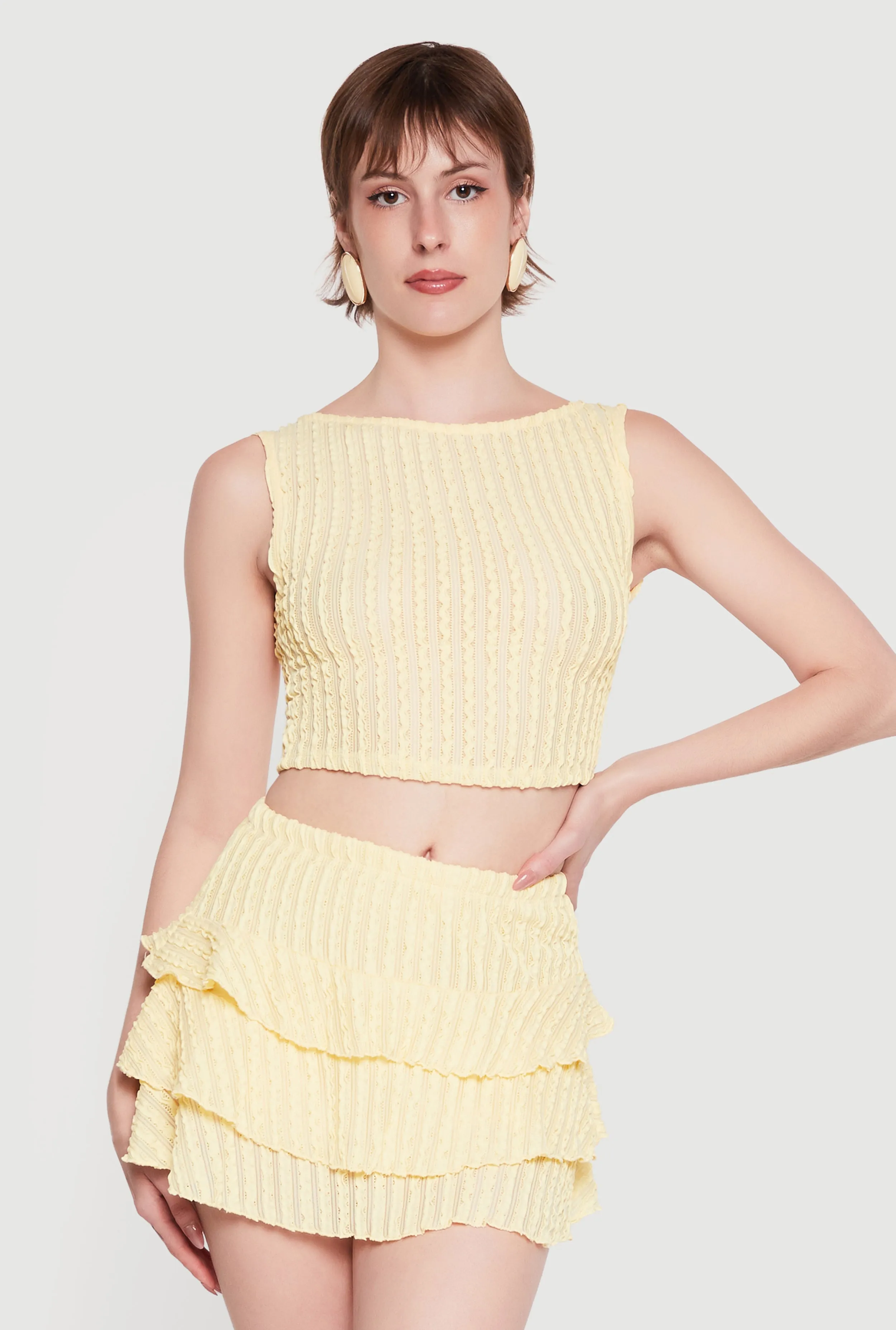 Sleeveless Textured Knit Solid Crop Top sold by Rainbow