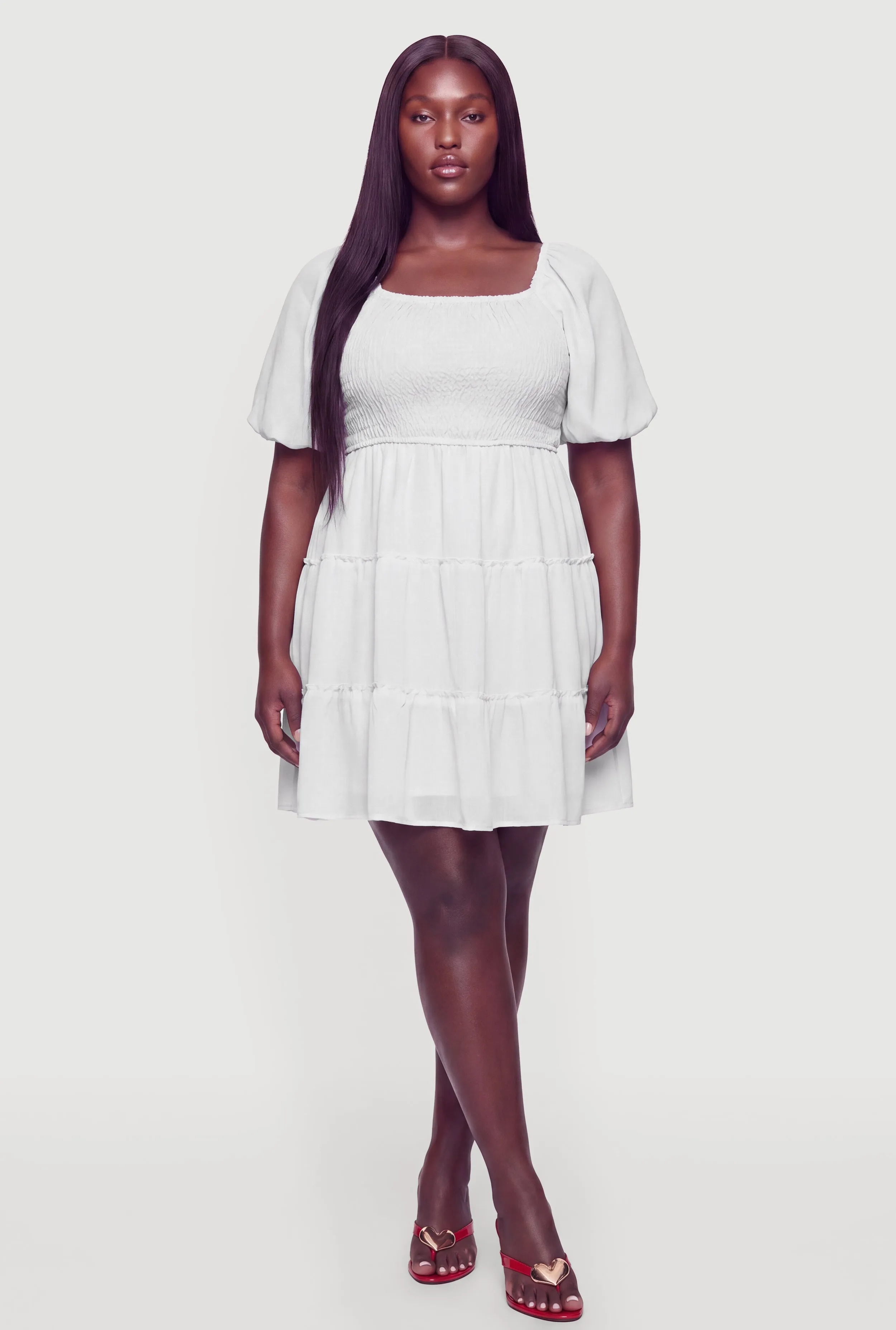 Plus Size Smocked Tiered Mini Dress sold by Rainbow