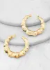 Bamboo Hoop Earrings sold by Rainbow
