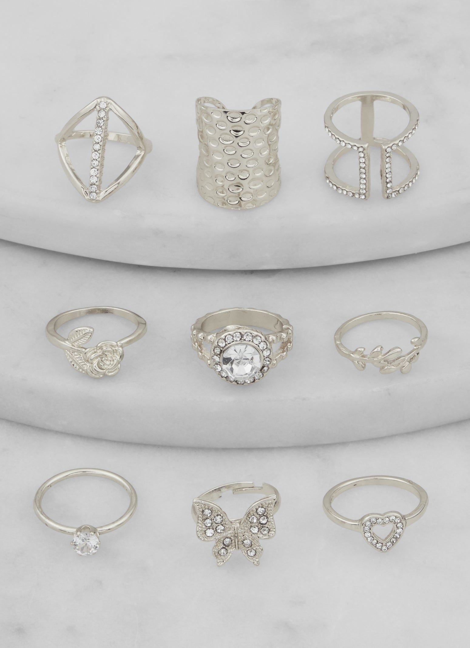 Metallic Cubic Zirconia Shaped Rings Set of 9 sold by Rainbow