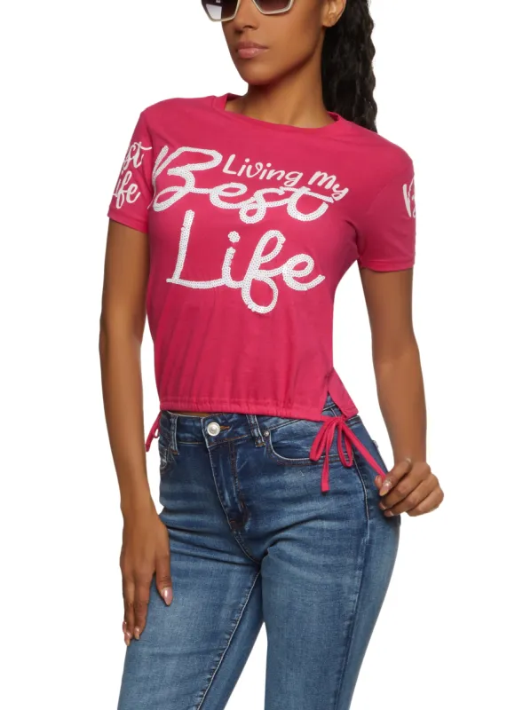 Living My Best Life Sequin Ruched Side Graphic Tee sold by Rainbow