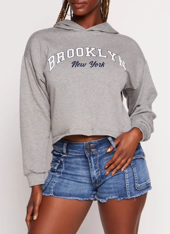 City Graphic Raw Hem Cropped Hoodie sold by Rainbow